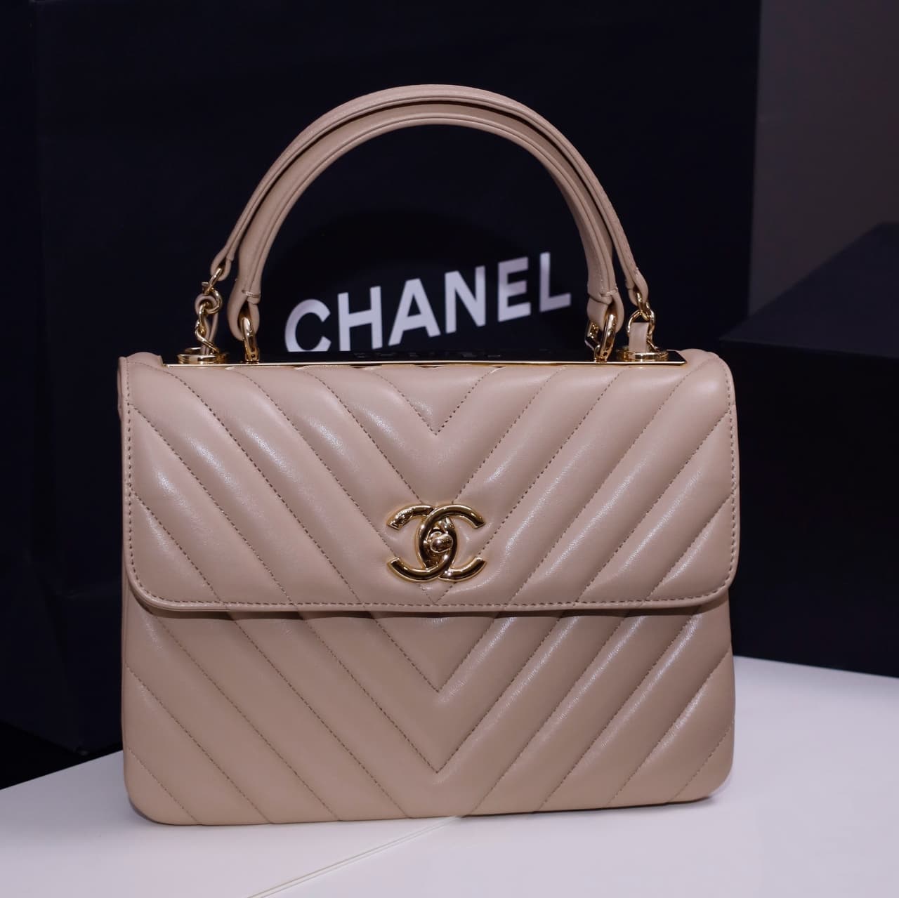 SMALL FLAP BAG WITH TOP HANDLE Lambskin Gold Metal Beige A