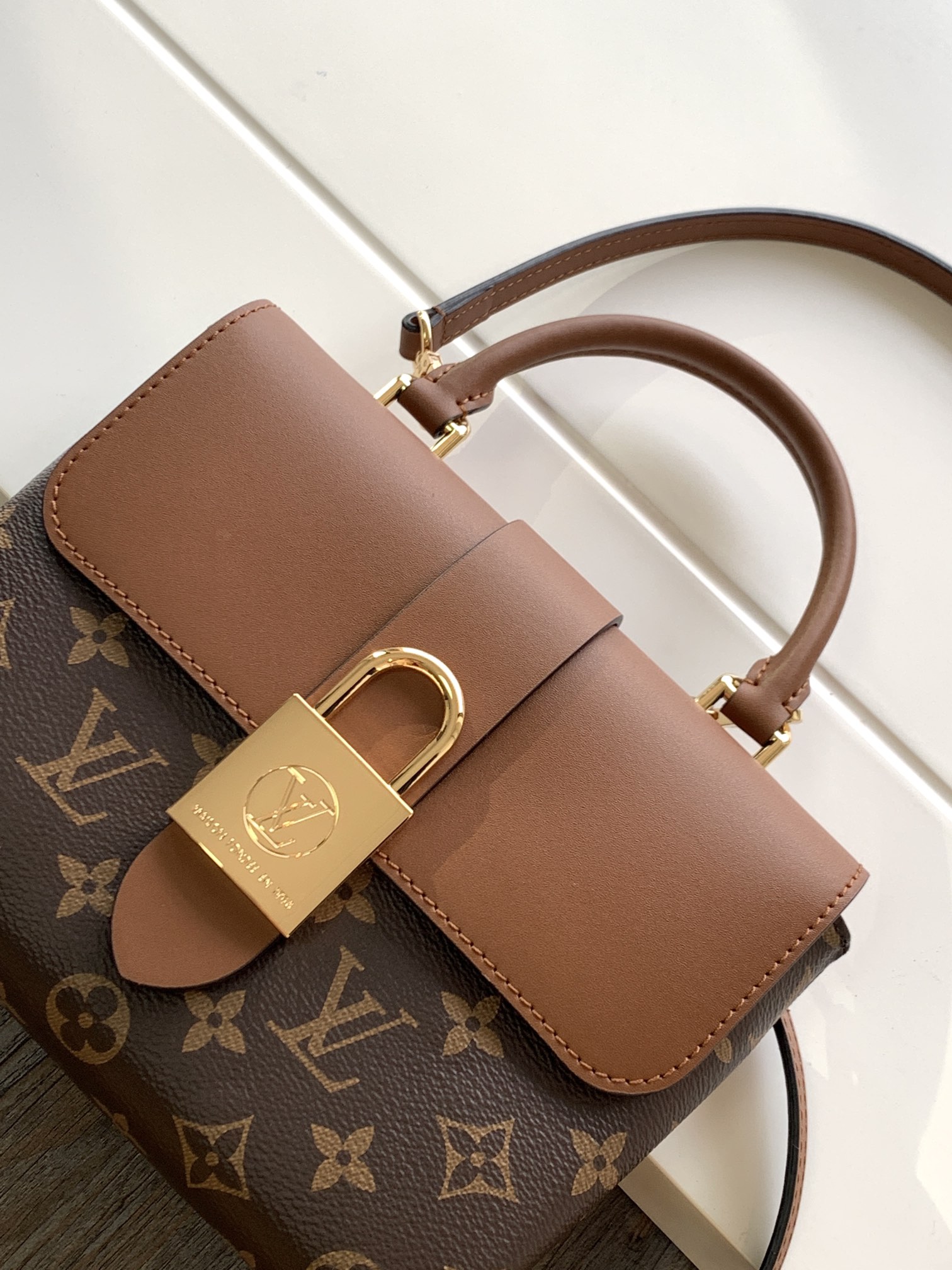 Louis Vuitton Locky BB Monogram coated canvas and smooth cowhide leather M44654 High