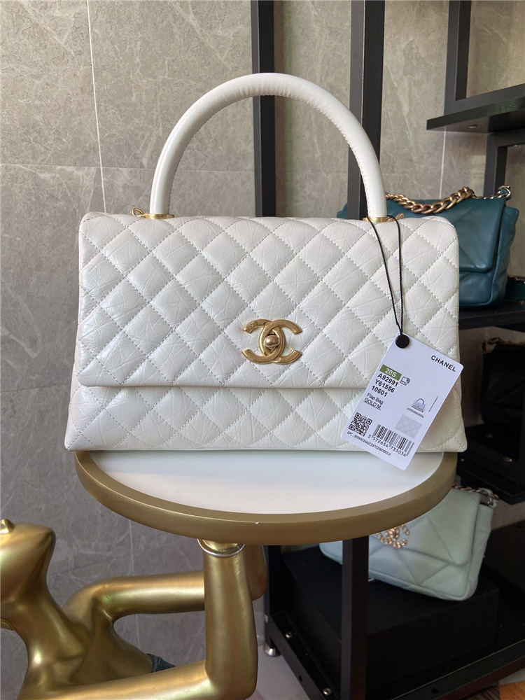 Medium FLAP BAG WITH TOP HANDLE Shiny Calfskin Gold Metal High