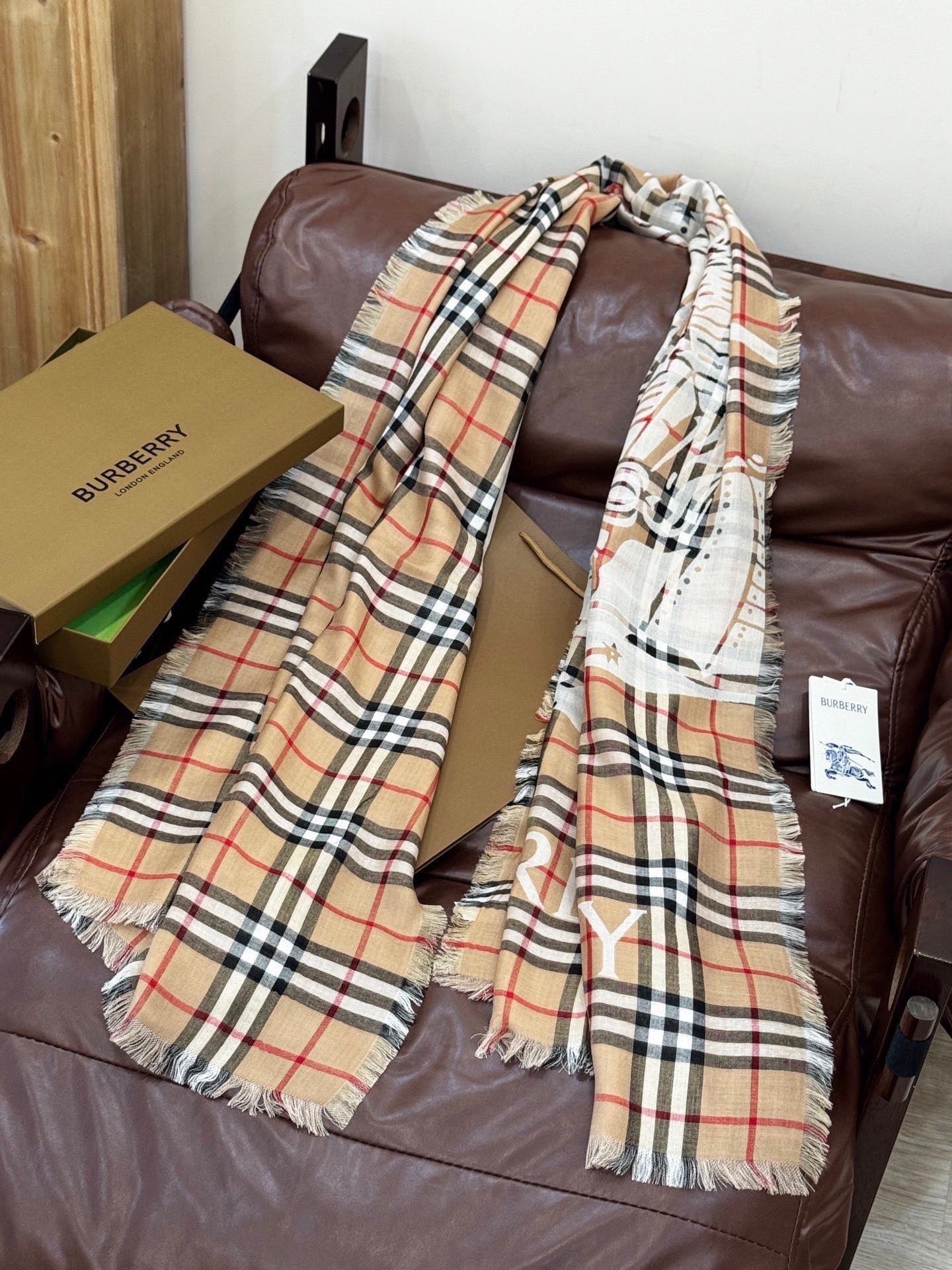 Burberry scarf featuring  check pattern and equestrian knight motif