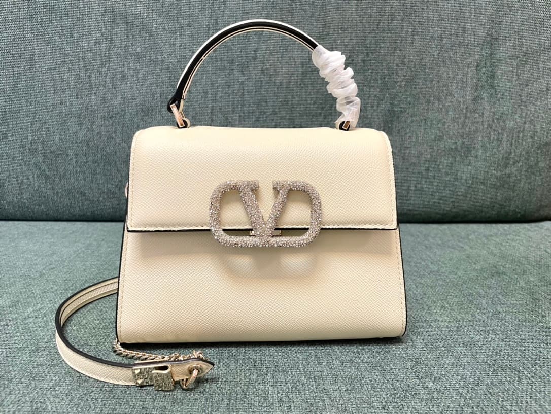 Valentino Garavani Vsling Mini Handbag In Grainy Calfskin With Jewel Logo High