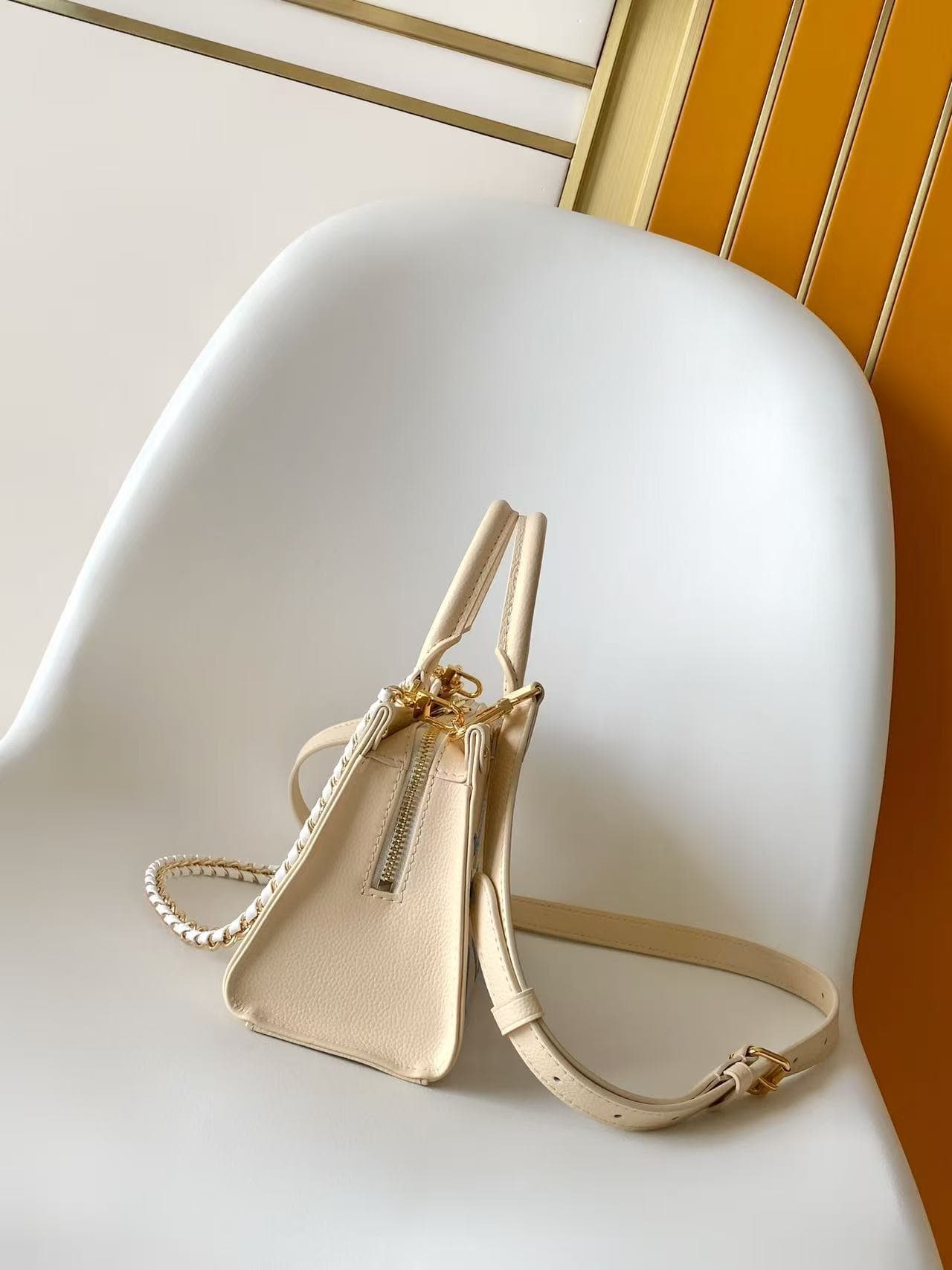 Louis Vuitton Onthego East West Light Bliss Couture Cowhide leather M29487 High