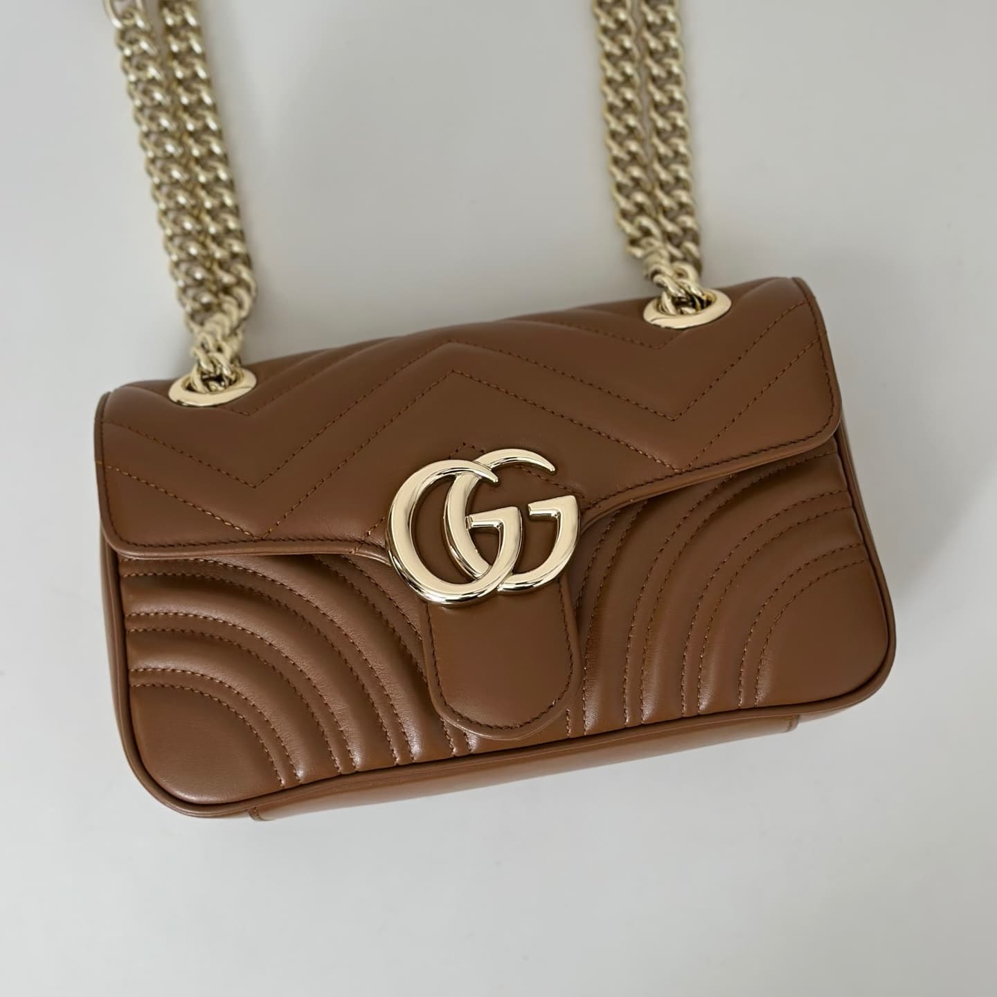 GG Marmont mini matelassé shoulder bag brown leather 446744 high