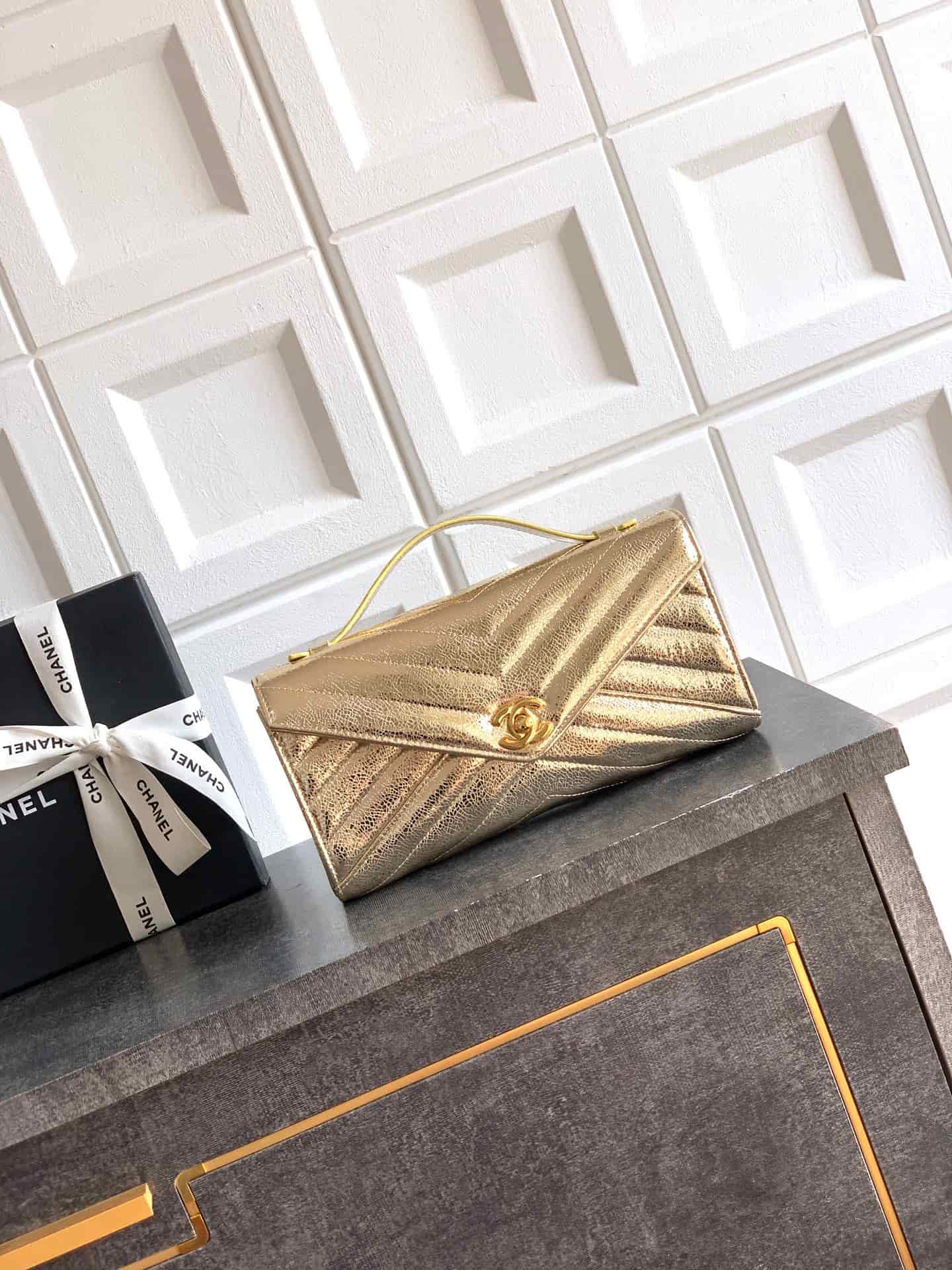 Chanel Flap Bag with Top Handle Metallic Chevron Lambskin Leather Finish& Champagne Gold-Tone Metal Gold AS6044 A
