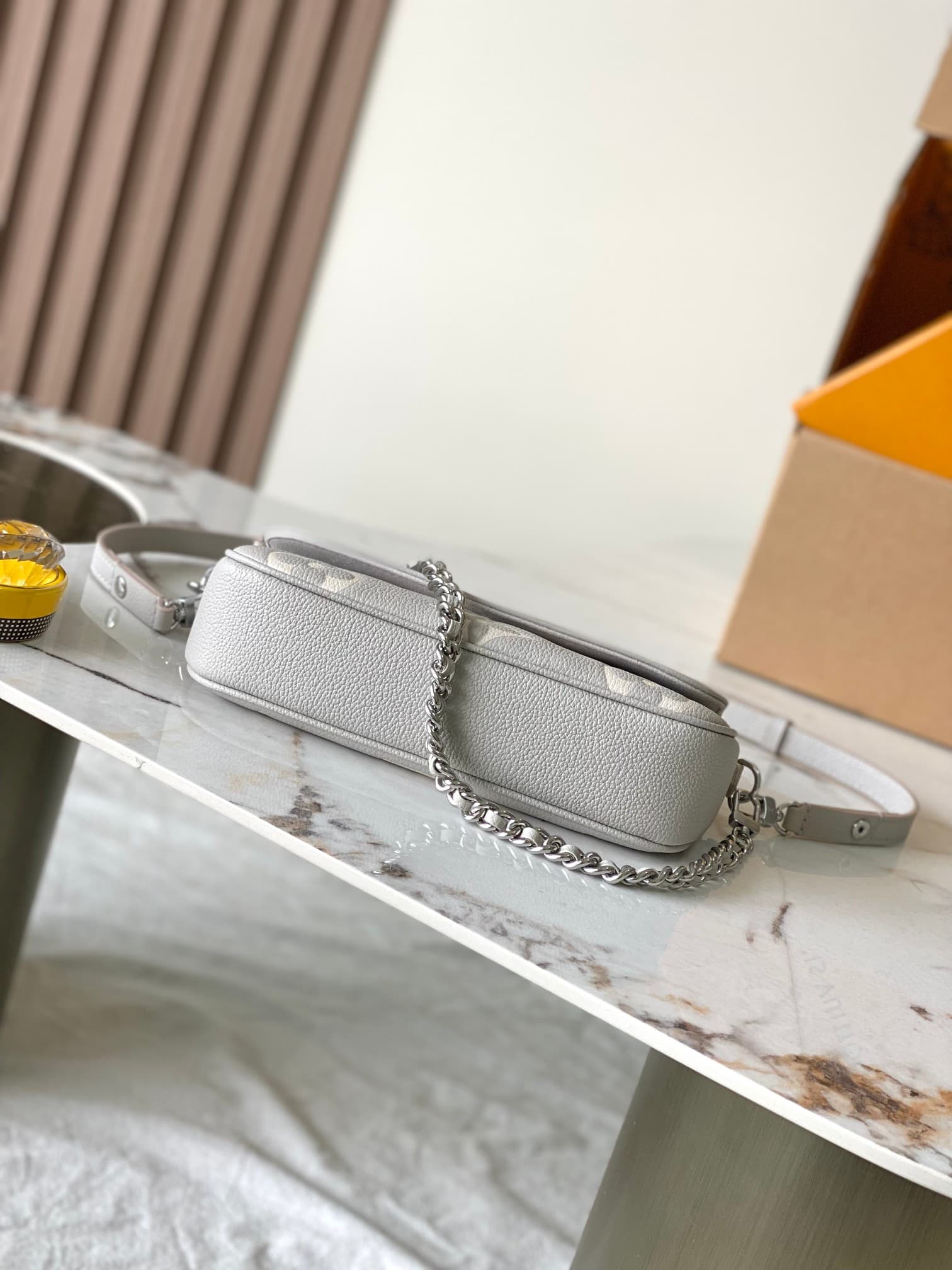 Louis Vuitton Wallet On Chain Ivy Embossed grained cowhide leather M14225 Brume Gray / White Quartz TOP