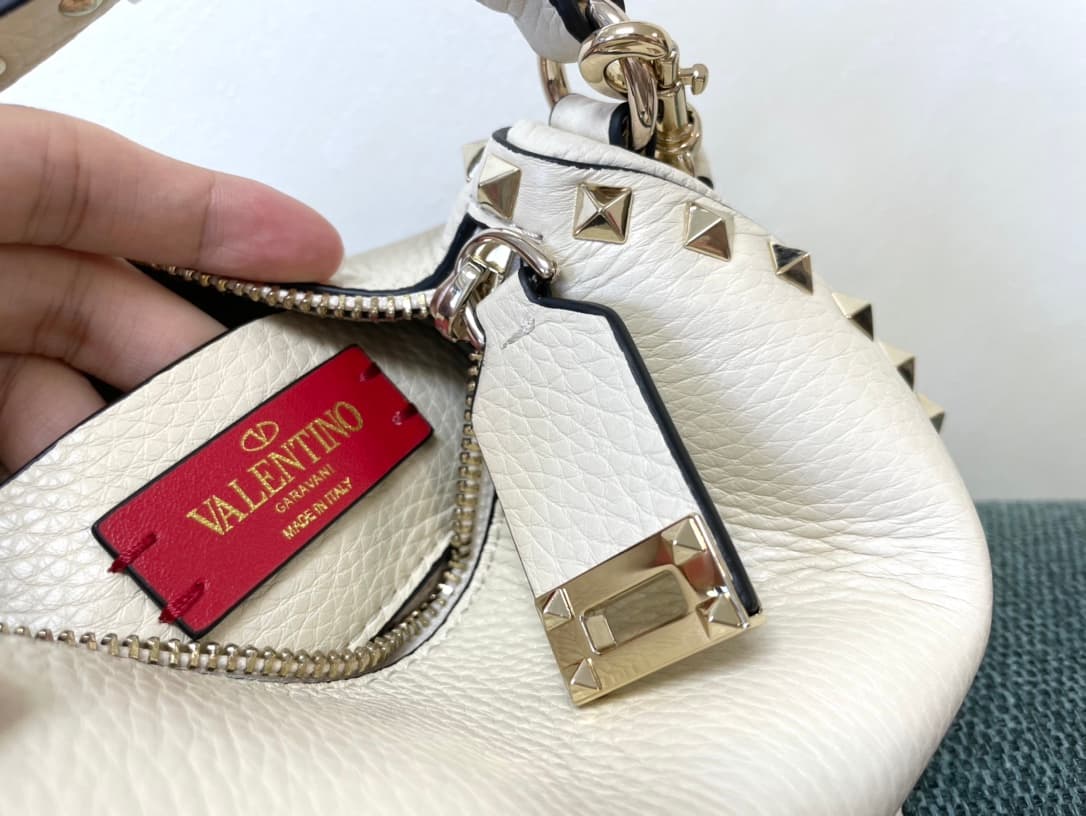Valentino Garavani Mini Rockstud crossbody bag in White Grained Calfskin High