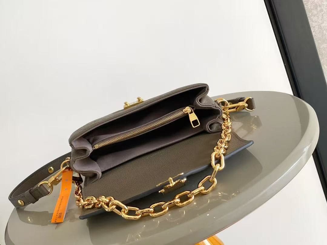 Louis Vuitton Pochette Metis East West Smoke Monogram Empreinte Leather M25910 TOP