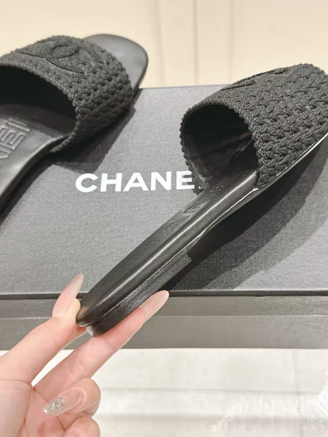 Chanel black crochet CC mules
