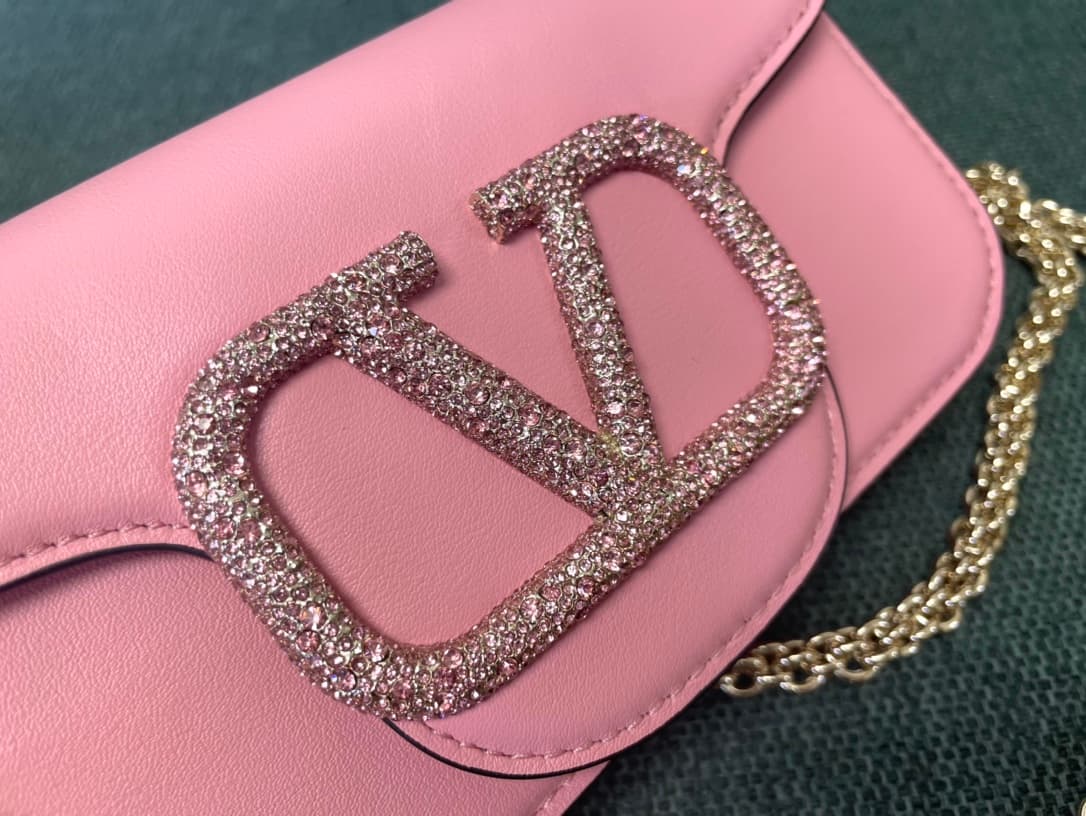 Valentino Garavani Locò Mini leather shoulder bag with crystal VLogo High