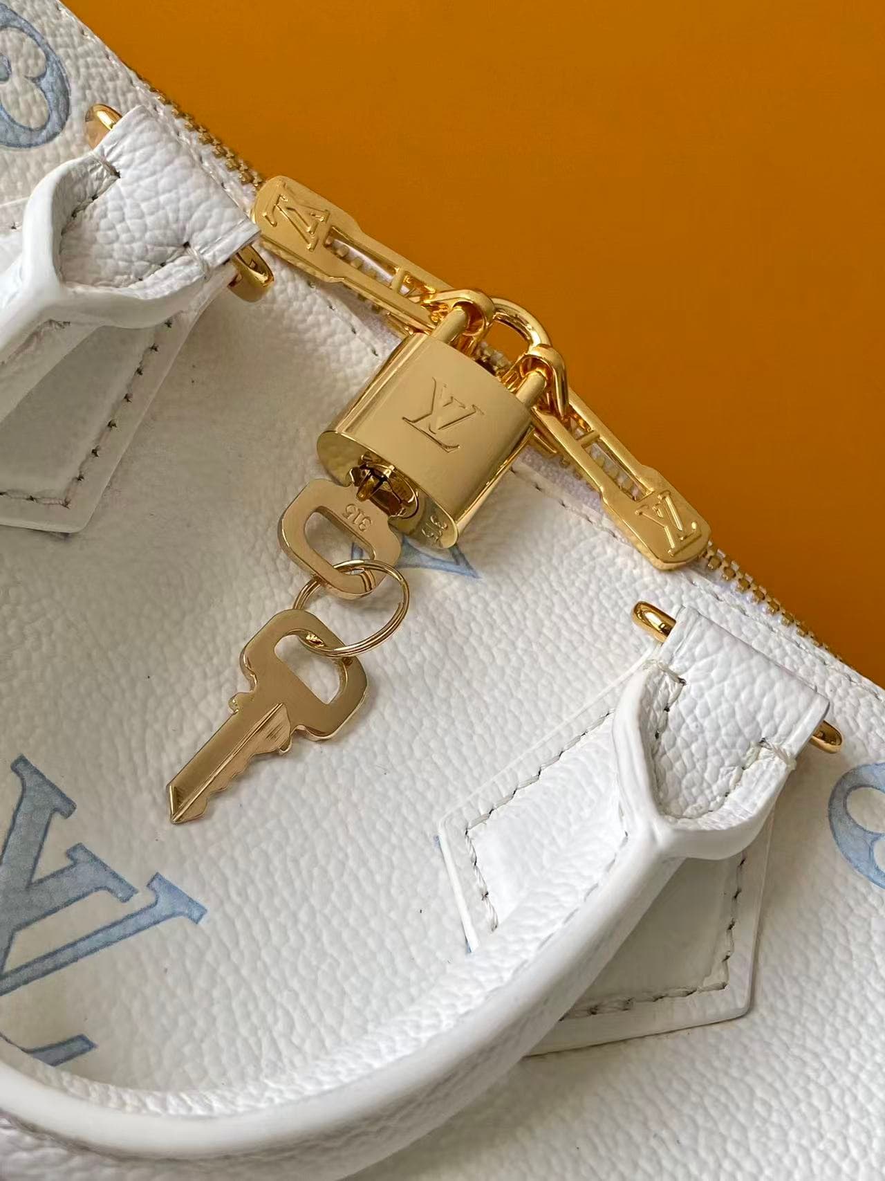 Louis Vuitton Speedy Bandoulière 20 Milky White/Blue Monogram Empreinte Leather M28314 High
