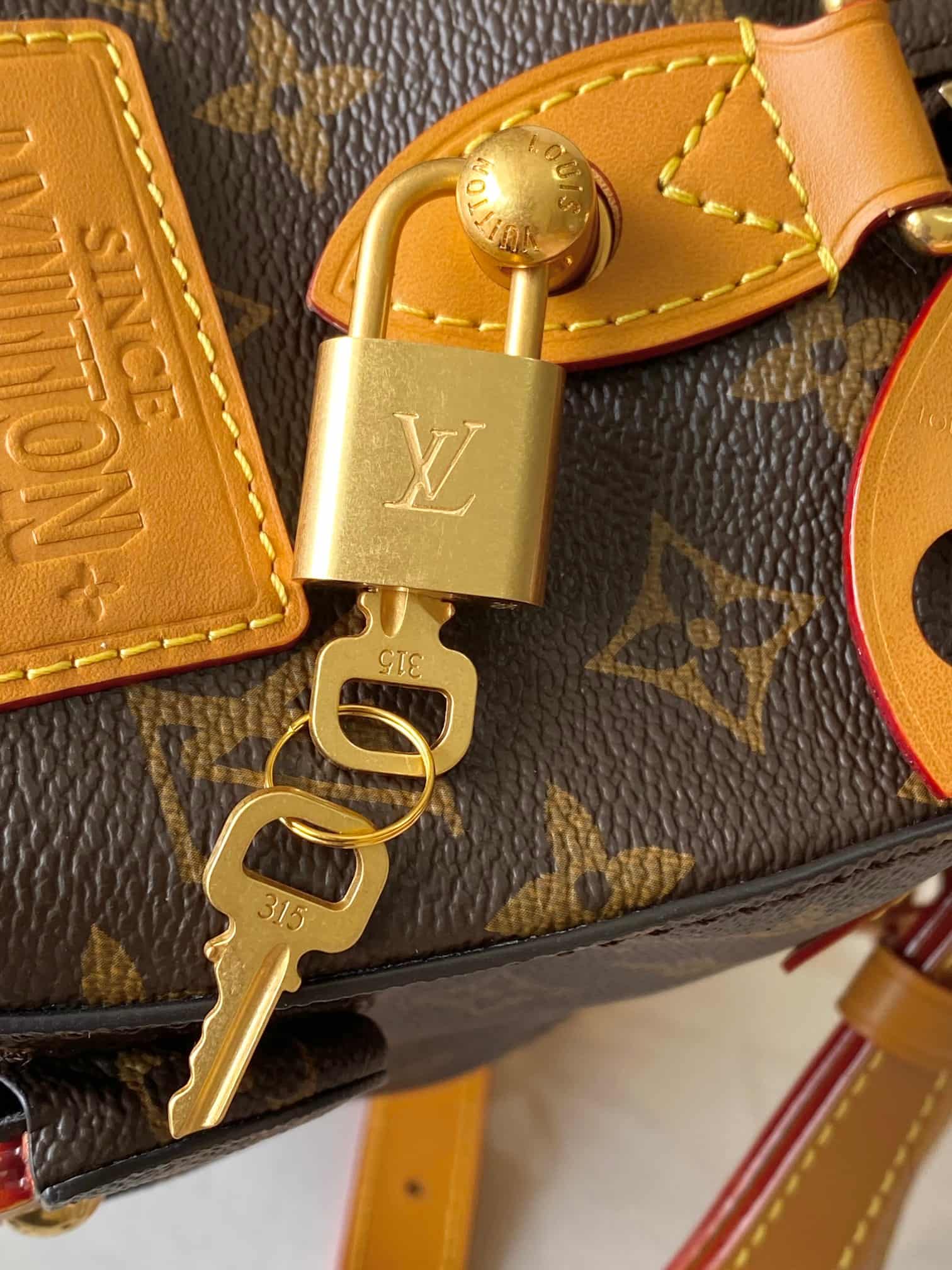 Louis Vuitton Rickshaw Wearable Wallet Monogram coated canvas M28020 TOP