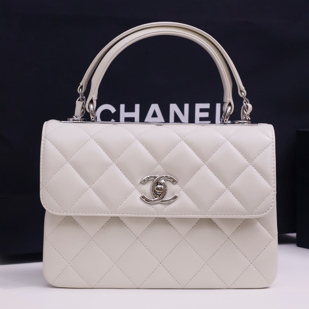 SMALL FLAP BAG WITH TOP HANDLE Lambskin Silver Metal White A
