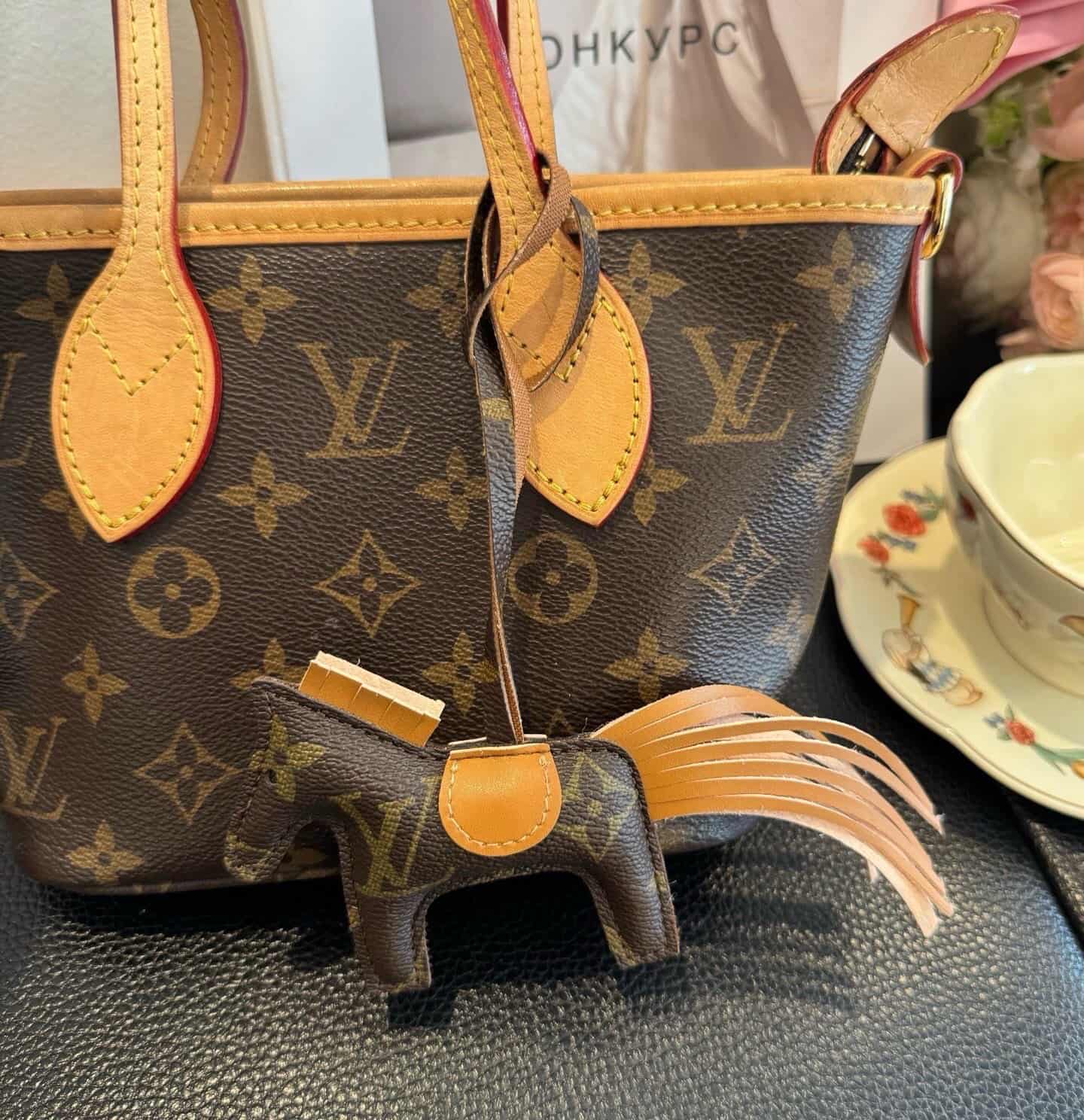 Louis Vuitton monogram canvas horse-shaped bag charm