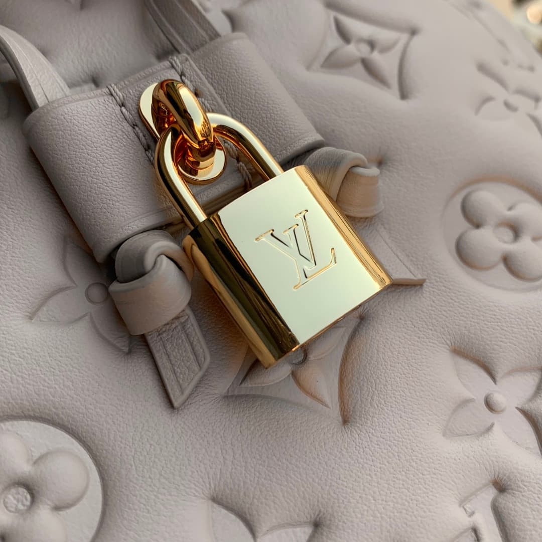 Louis Vuitton Coussin Bucket bag Monogram-embossed lambskin M26530 beige high