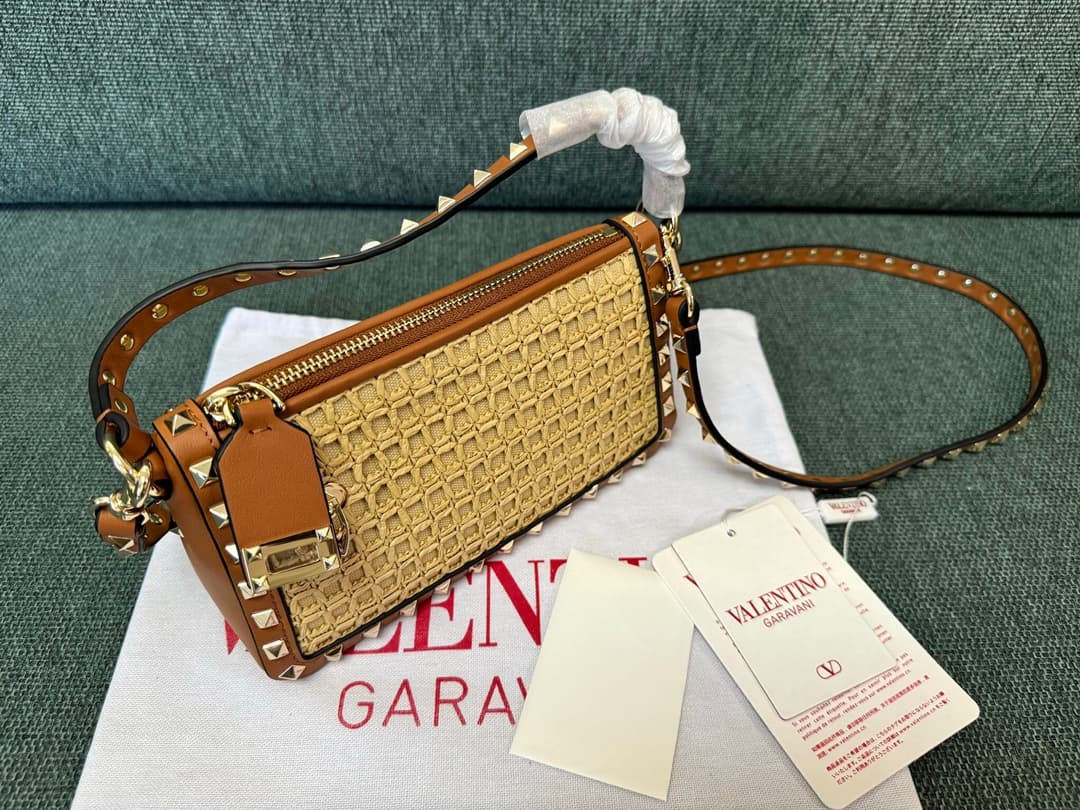 Valentino Garavani Rockstud Raffia and leather crossbody clutch High