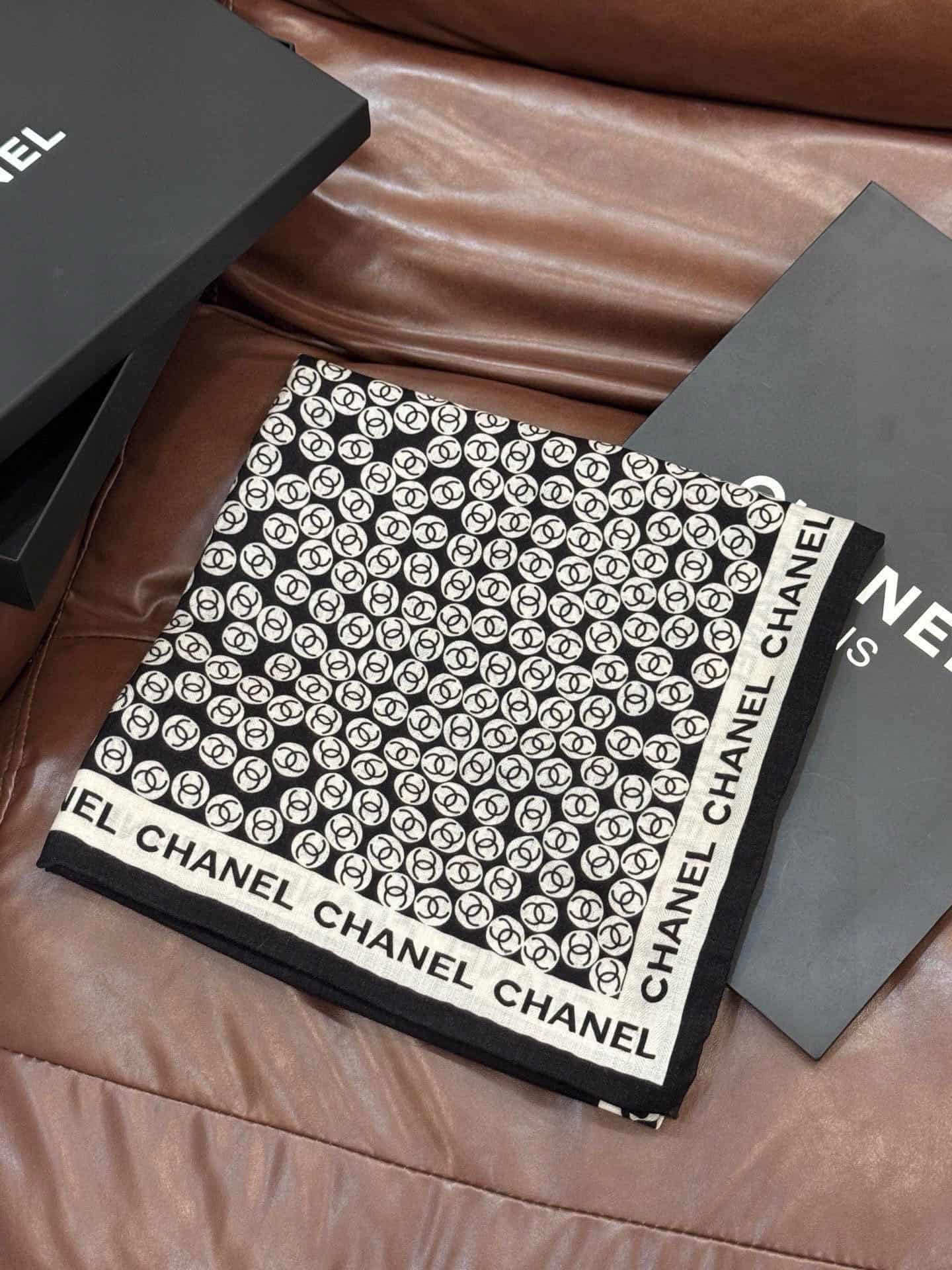 Chanel silk scarf featuring polka dot pattern