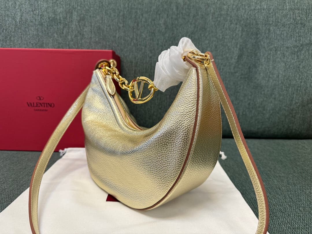 Valentino Garavani VLogo Moon small hobo bag in Gold grained calfskin High