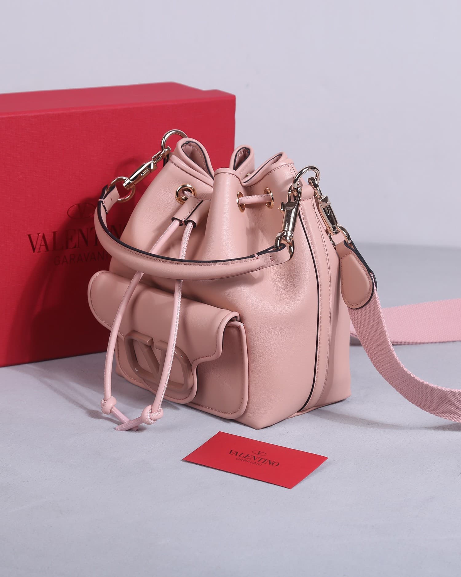 Valentino Garavani Locò calfskin leather bucket bag in soft pink 22058 High