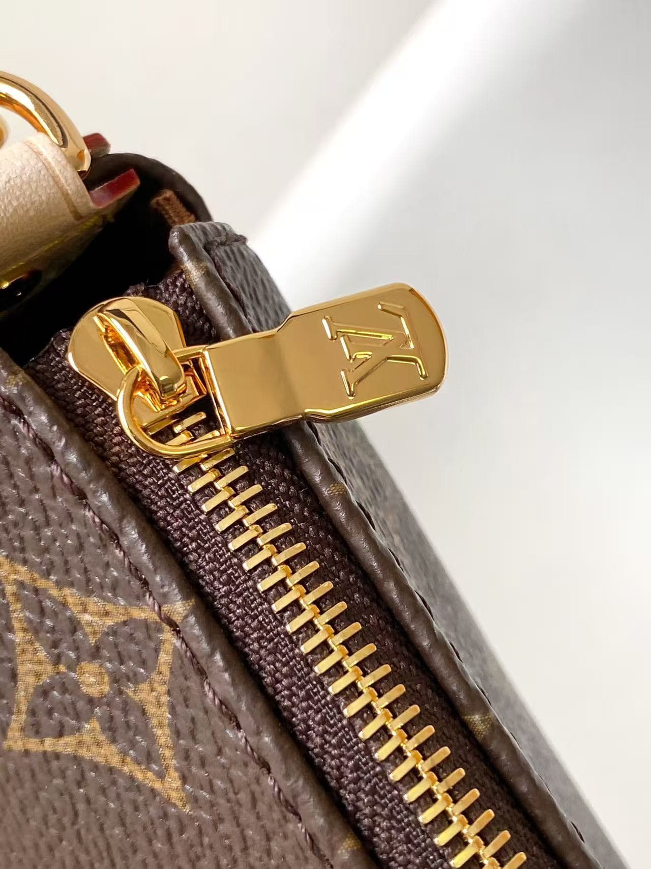 Louis Vuitton Pochette Eva Monogram coated canvas M13567 High