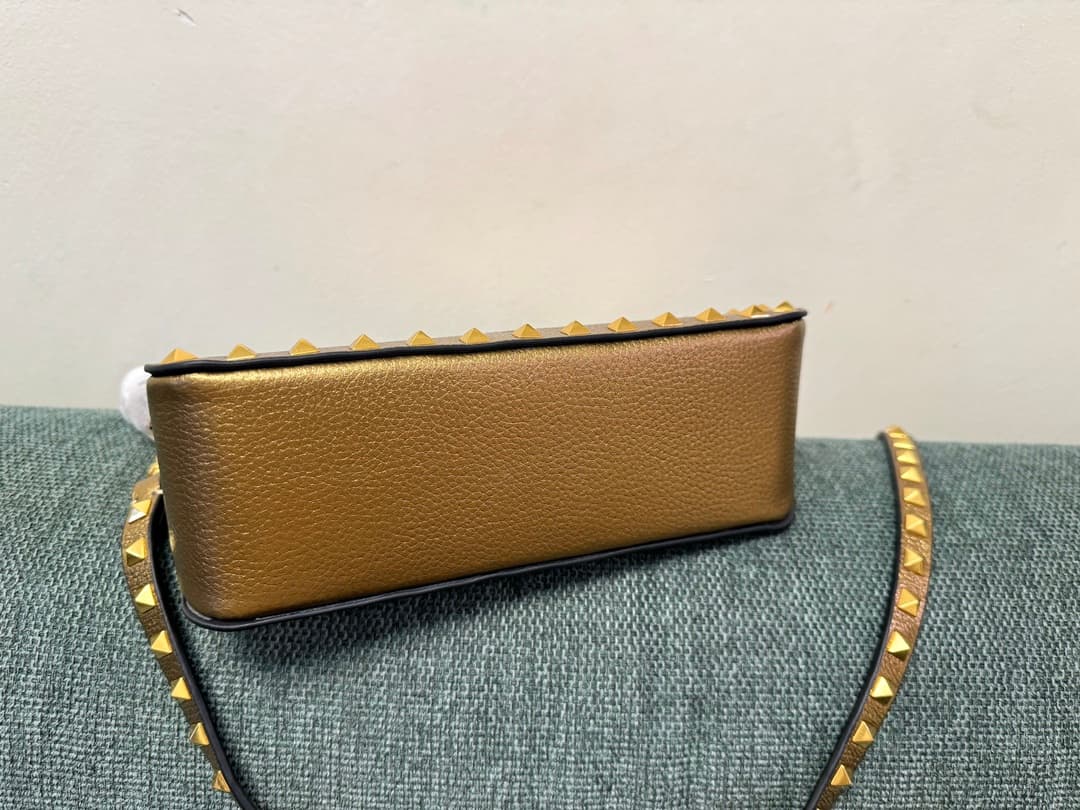 Valentino Garavani Mini Rockstud crossbody bag in Gold Grained Metallic Leather High