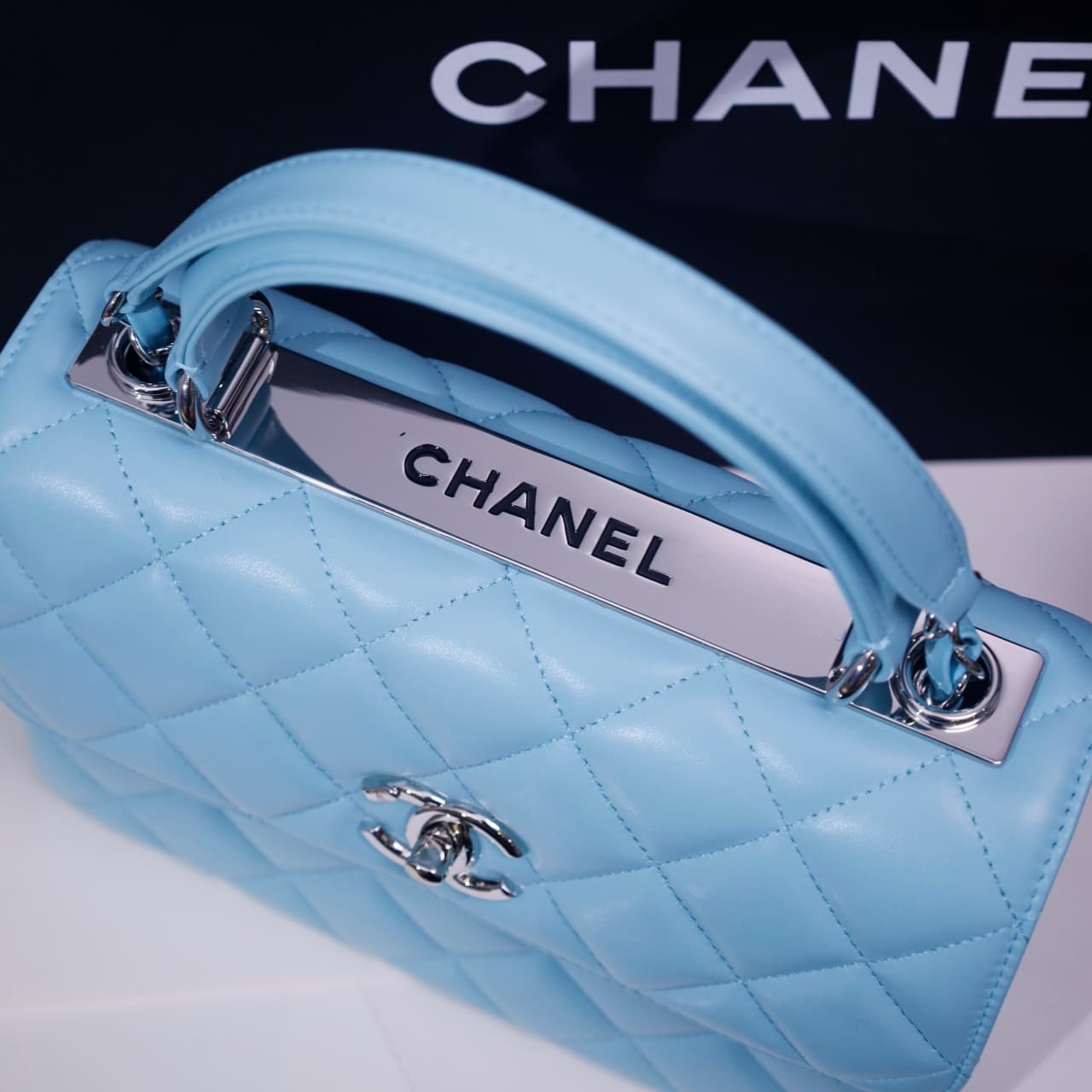 SMALL FLAP BAG WITH TOP HANDLE Lambskin Silver Metal Sky Blue A