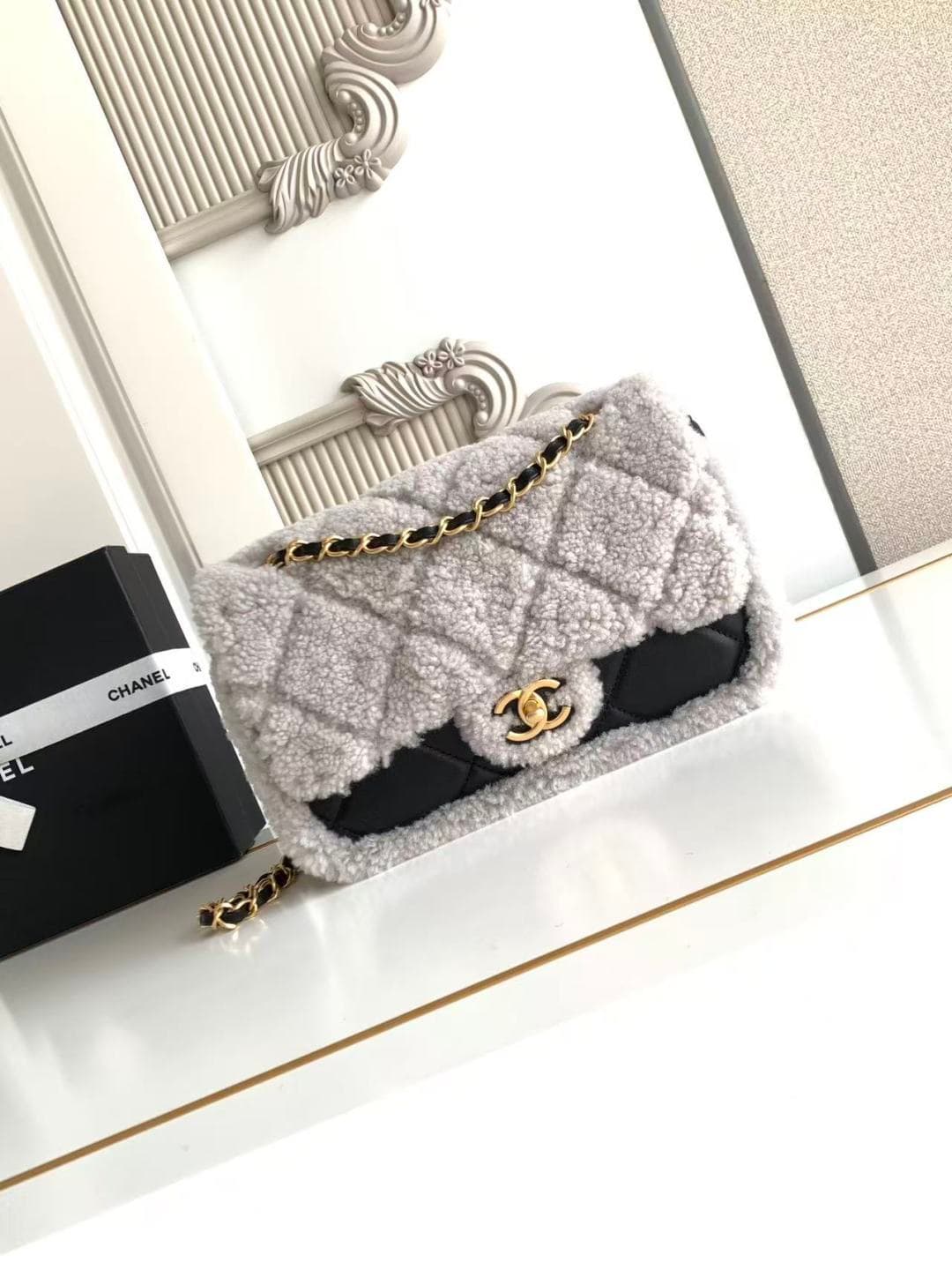Chanel Small Shearling Flap Bag in Black lambskin with grey shearling & Gold-Tone Metal AS5149 A