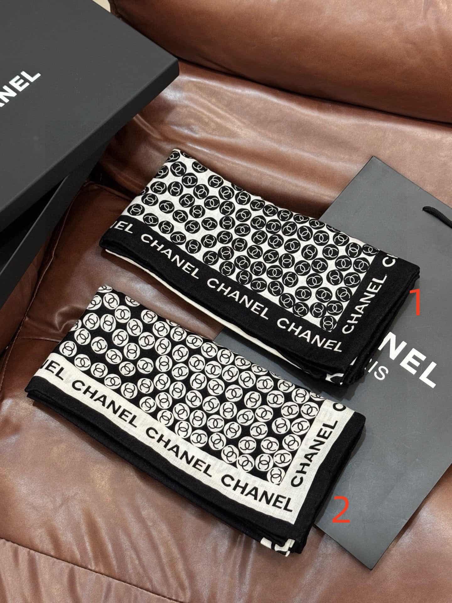 Chanel silk scarf featuring polka dot pattern