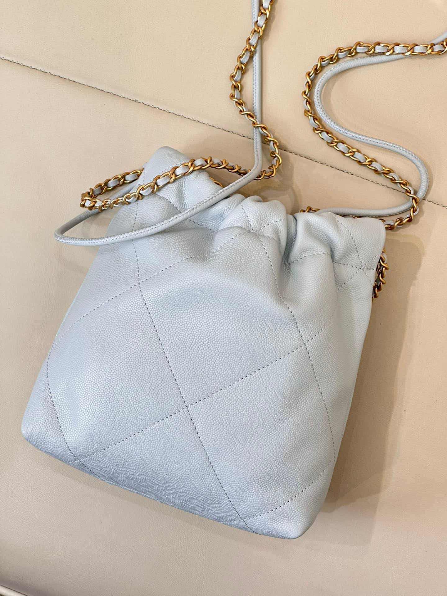 Chanel 22 MINI HANDBAG Shiny Calfskin Light Blue & Gold-Tone Metal AS3980 TOP