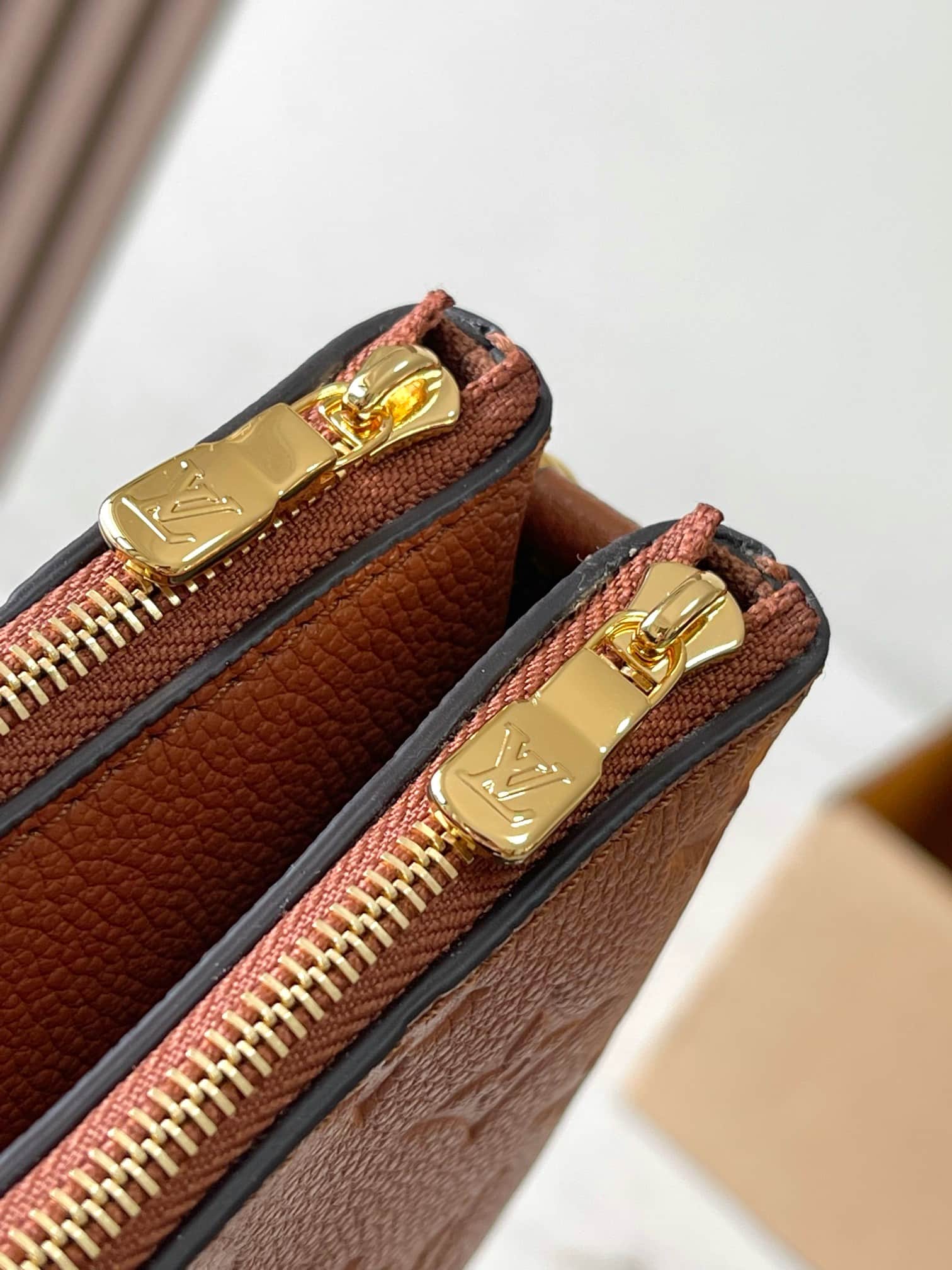 Louis Vuitton Pochette Liv Cognac Monogram Empreinte embossed supple grained cowhide leather M11916 TOP