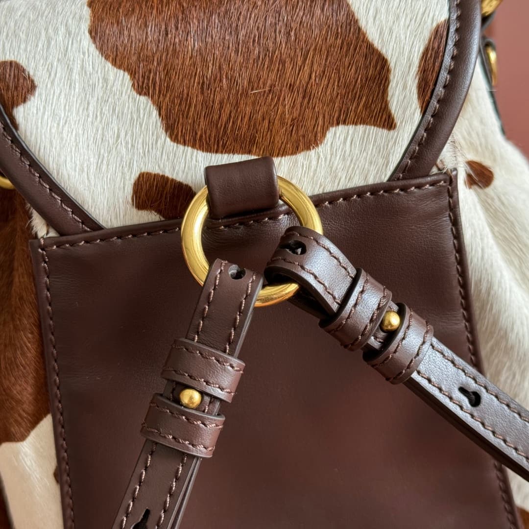 Miu Miu Calf Hair Backpack in brown and white cow print 5BZ043 TOP