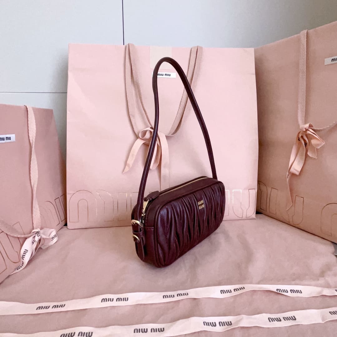 Miu Miu Black Matelassé Nappa Leather Pouch High