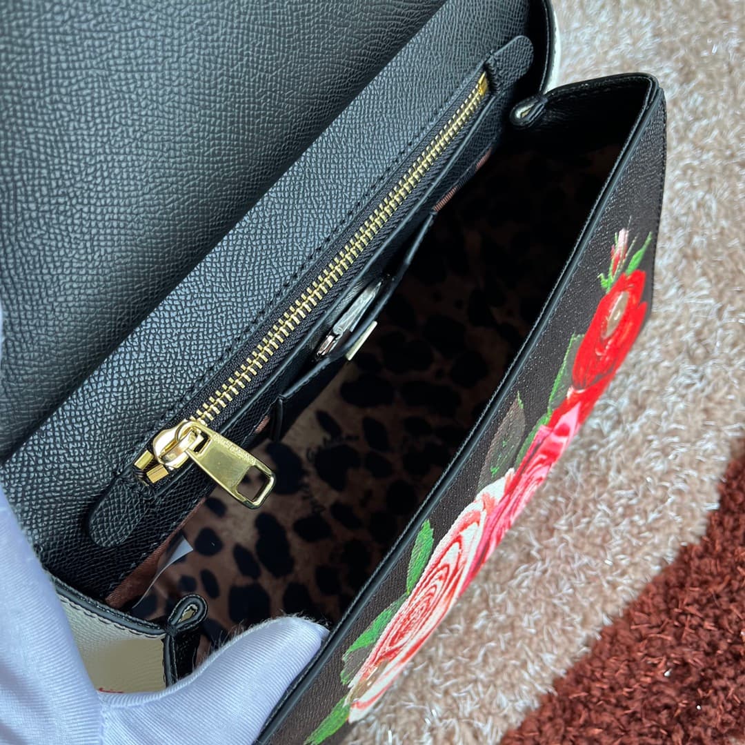 Dolce & Gabbana Miss Sicily top handle bag with vibrant red rose print leather High