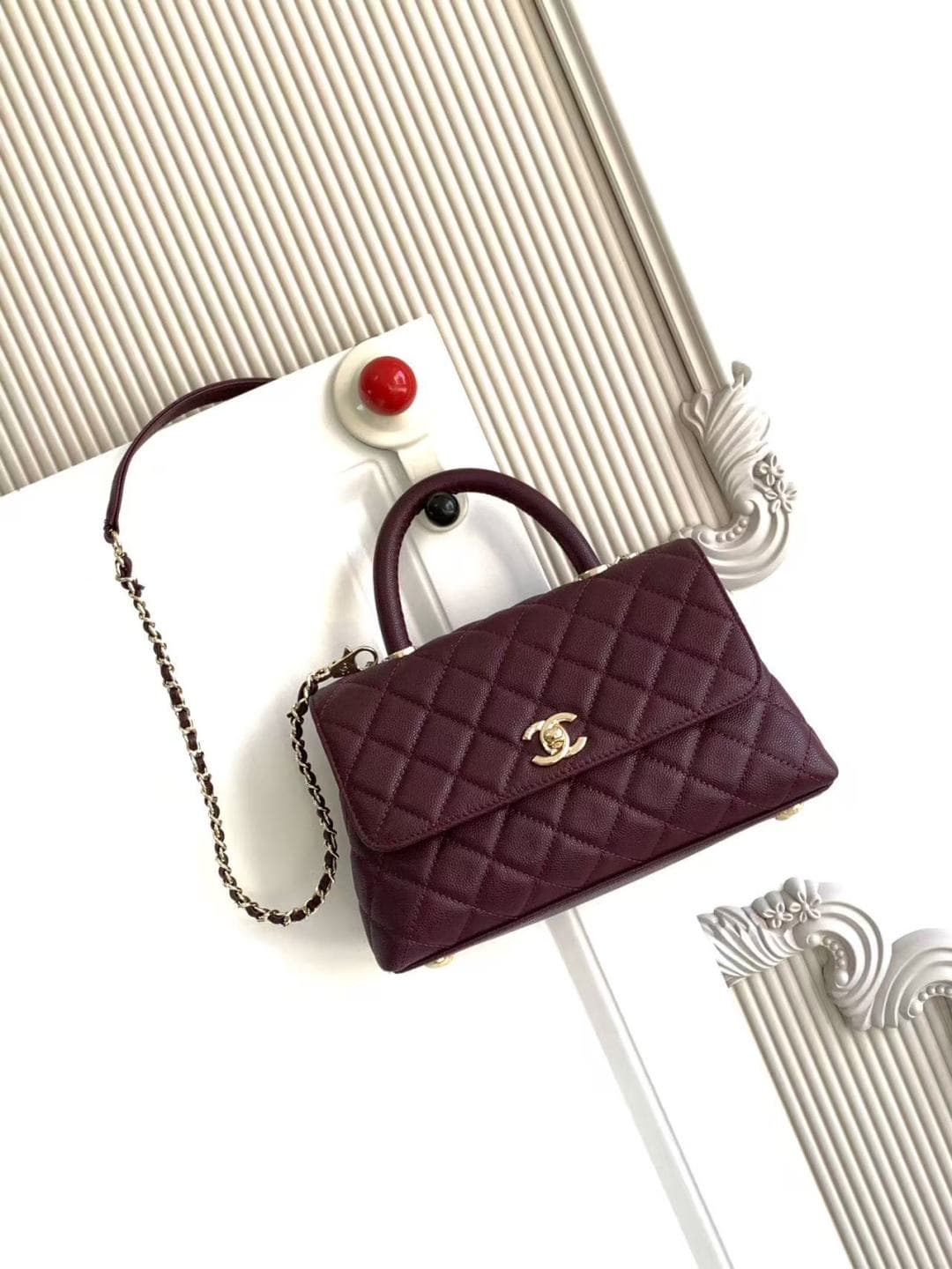 FLAP BAG WITH TOP HANDLE Grained Calfskin & Gold-Tone Metal A92990 Burgundy Binding A