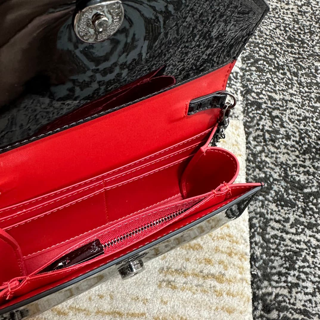 Christian Louboutin Loubi54 patent leather shoulder bag in black High