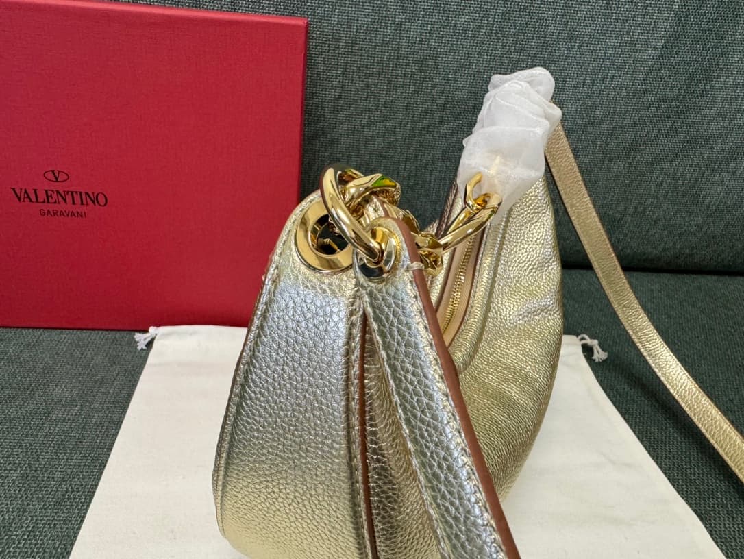 Valentino Garavani VLogo Moon small hobo bag in Gold grained calfskin High