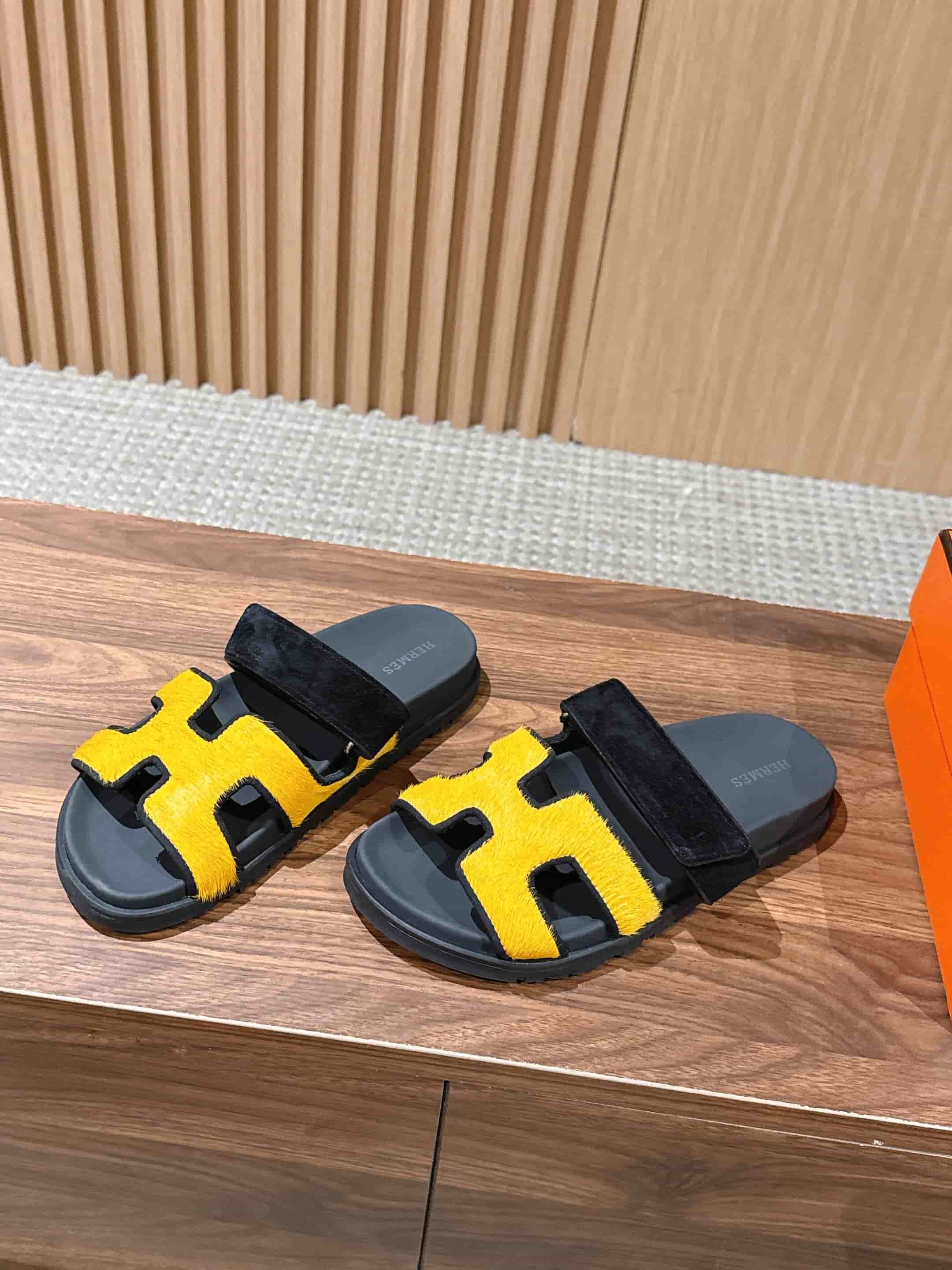 Hermès Chypre sandals in yellow suede with black accents Women Men