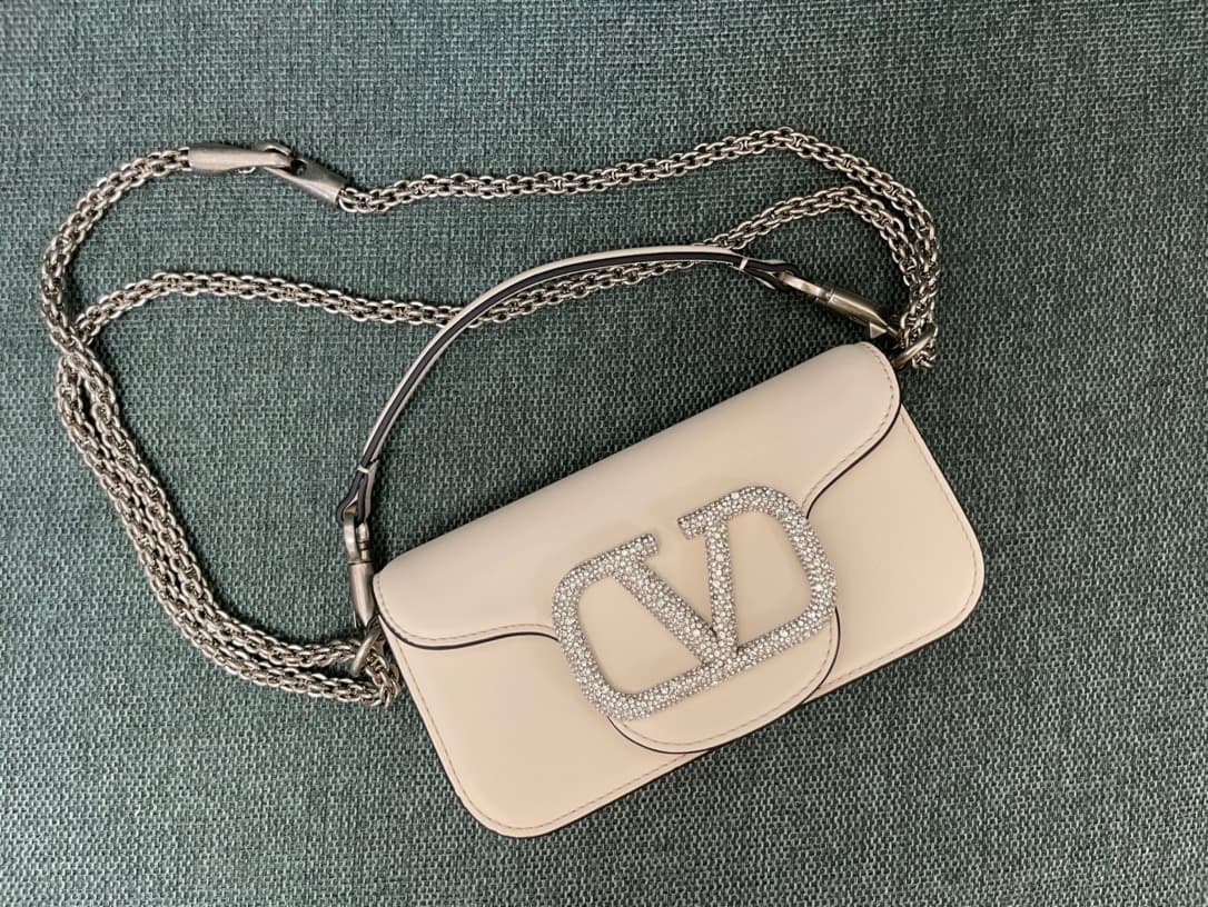 Valentino Garavani Locò Mini leather shoulder bag with crystal VLogo High