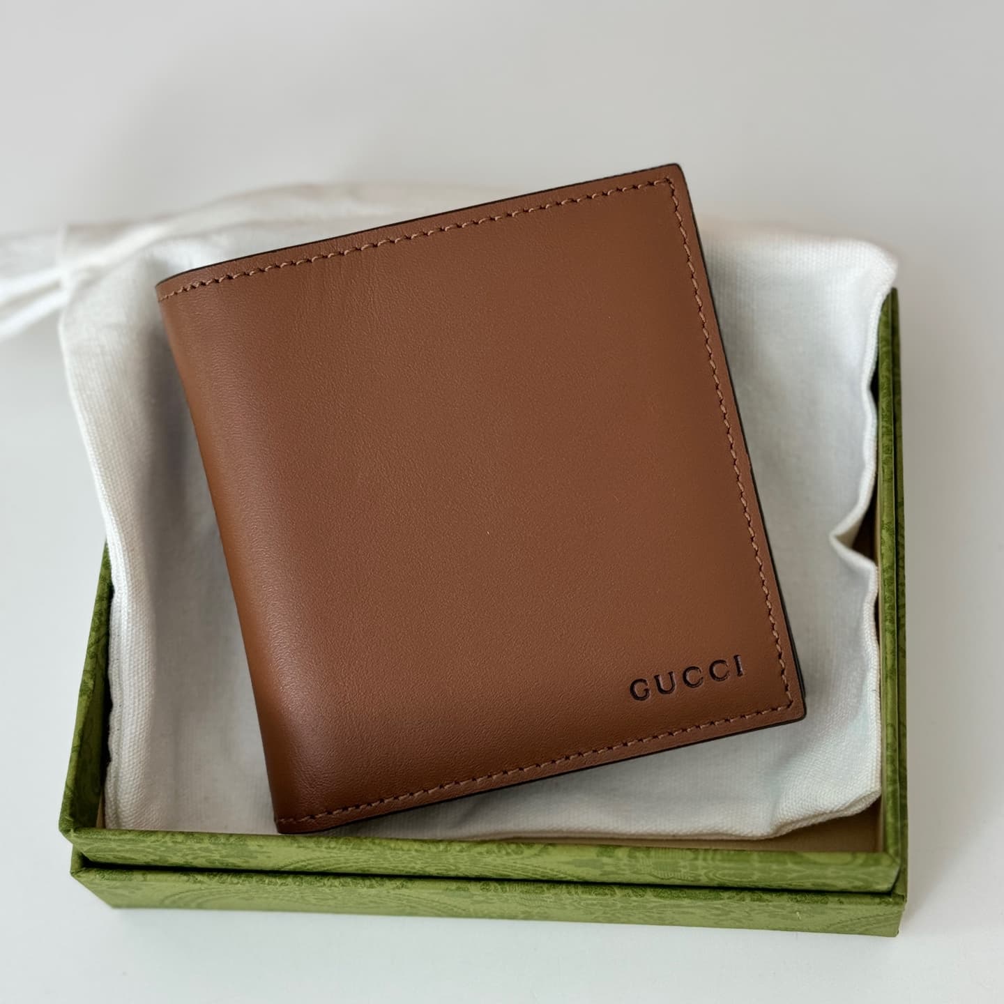 GG Emblem bi-fold wallet with GG fabric Brown smooth leather 818949  High