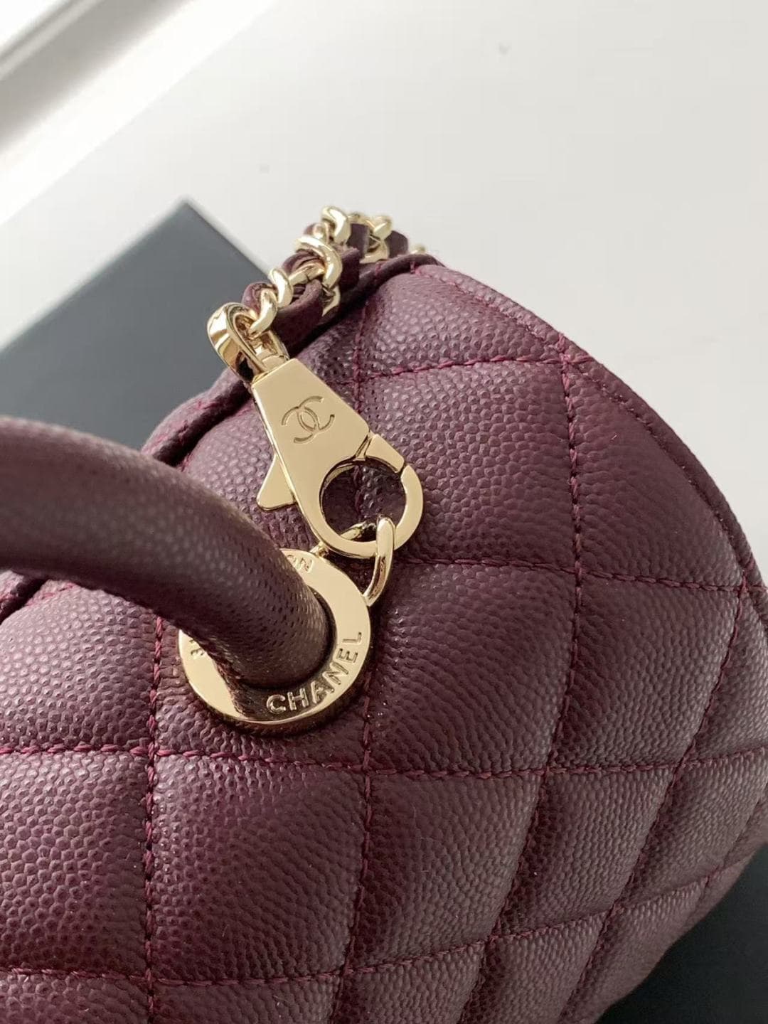 FLAP BAG WITH TOP HANDLE Grained Calfskin & Gold-Tone Metal A92990 Burgundy Binding A