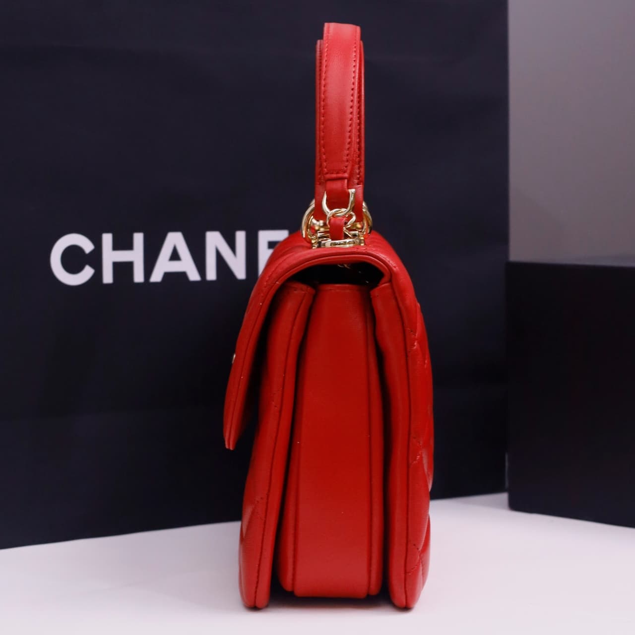SMALL FLAP BAG WITH TOP HANDLE Lambskin Gold Metal Red A
