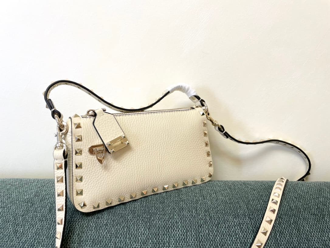 Valentino Garavani Mini Rockstud crossbody bag in White Grained Calfskin High