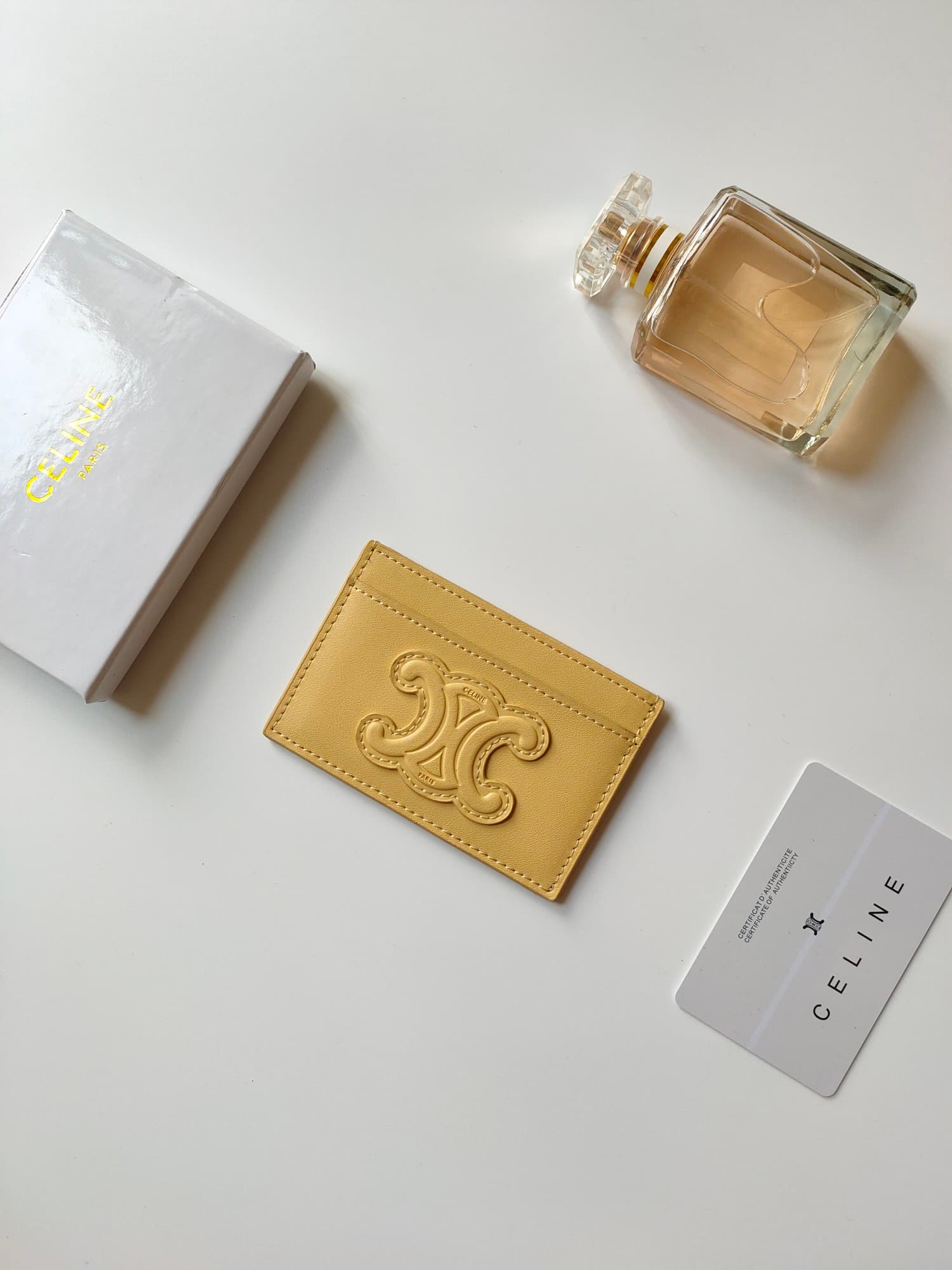 Celine Triomphe card holder in yellow shiny calfskin leather 10B703 High