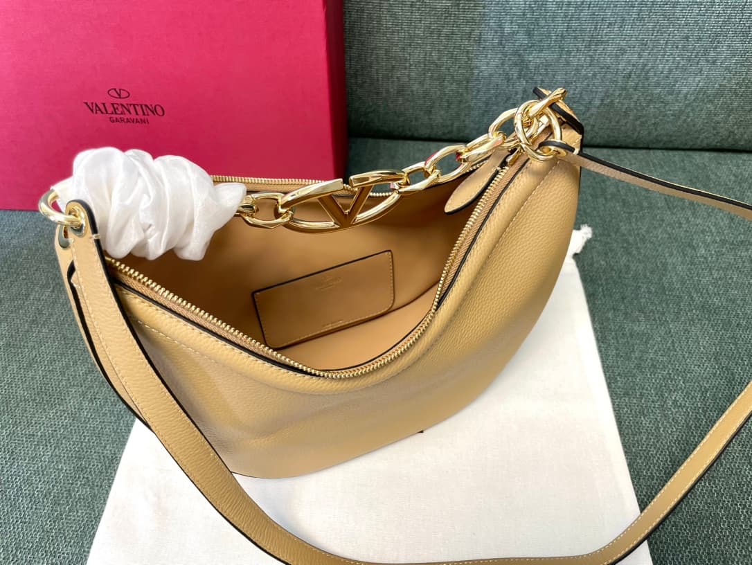 Valentino Garavani VLogo Moon small hobo bag in beige grained calfskin High