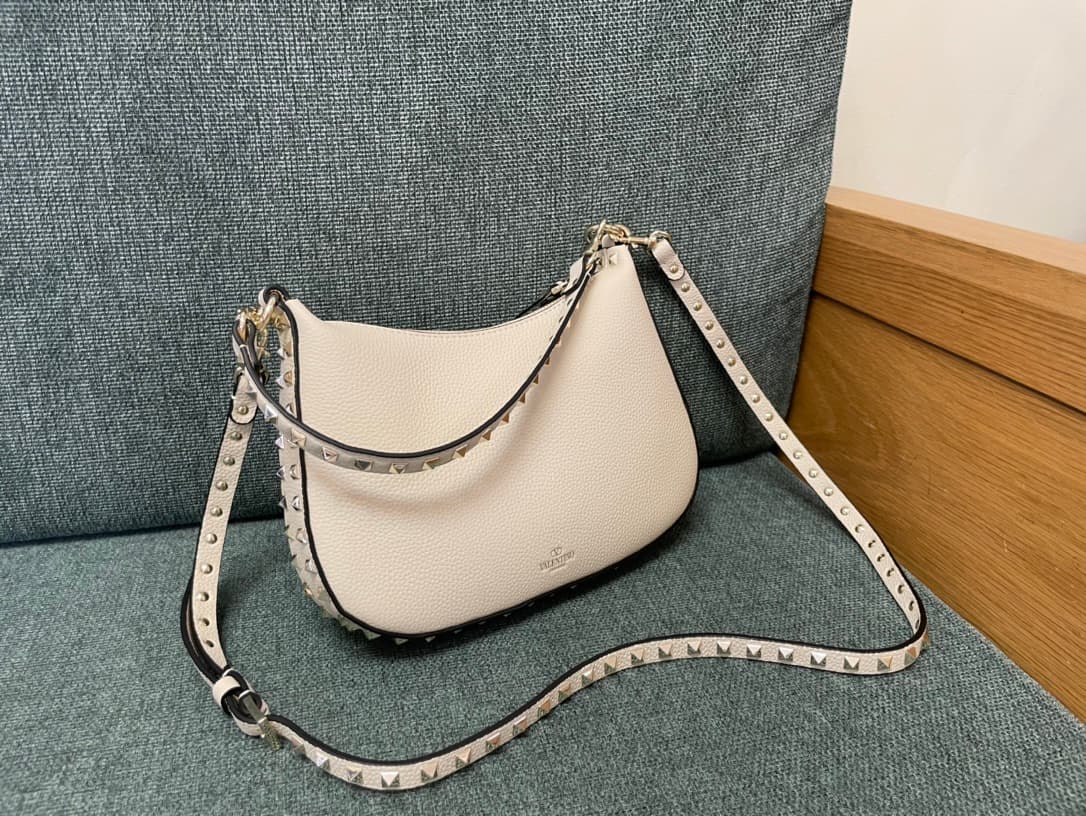 Valentino Garavani Rockstud Hobo bag in grainy white calfskin high