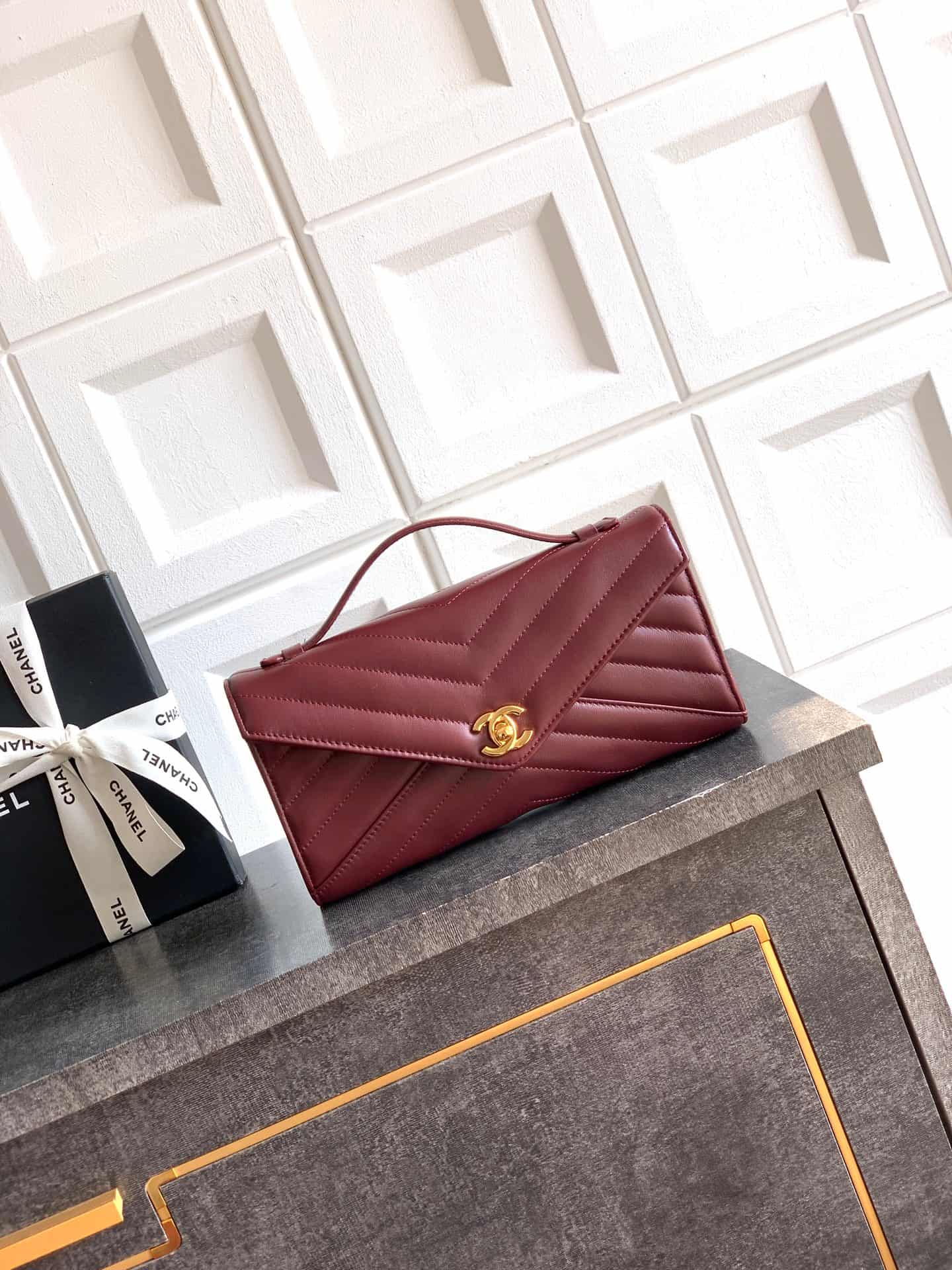 Chanel Flap Bag with Top Handle Chevron Lambskin& Gold-Tone Metal Claret AS6044 A