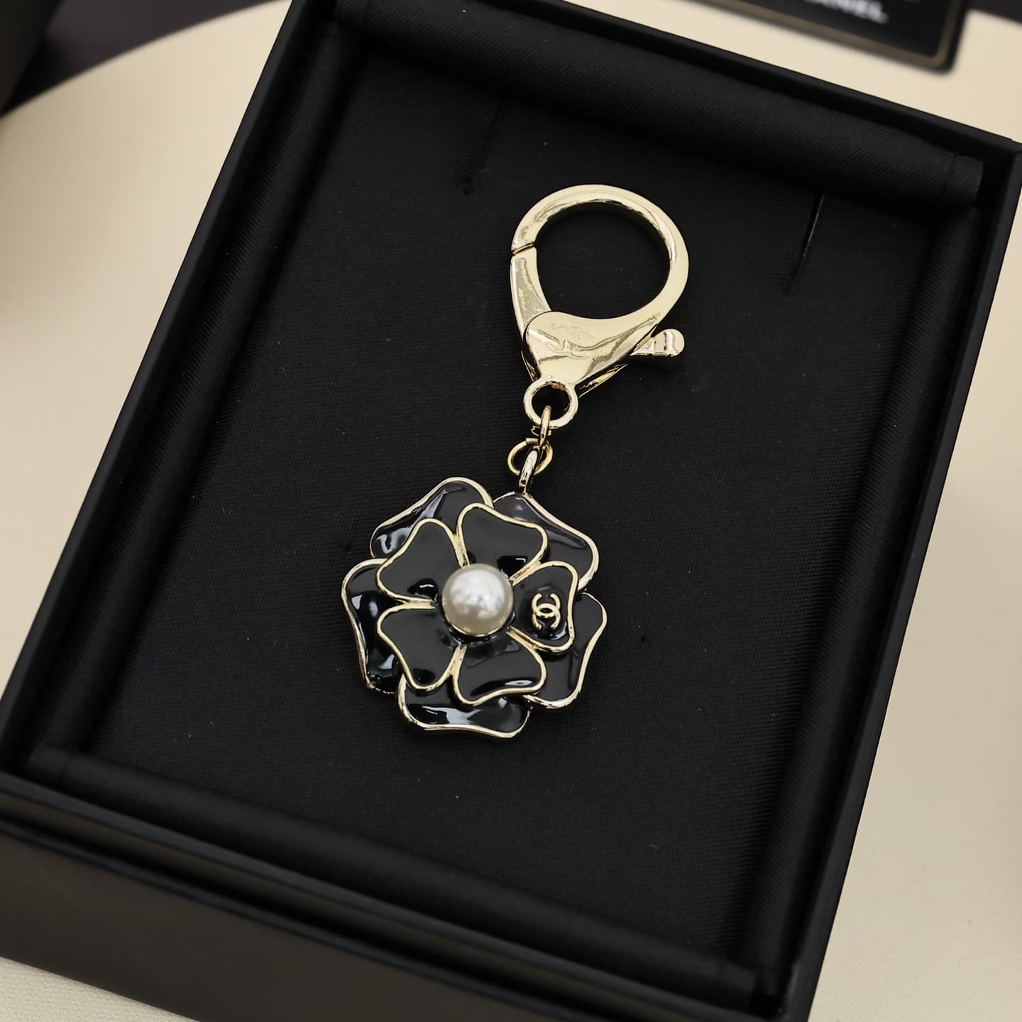 Chanel Enamel Camellia Pearl Keychain