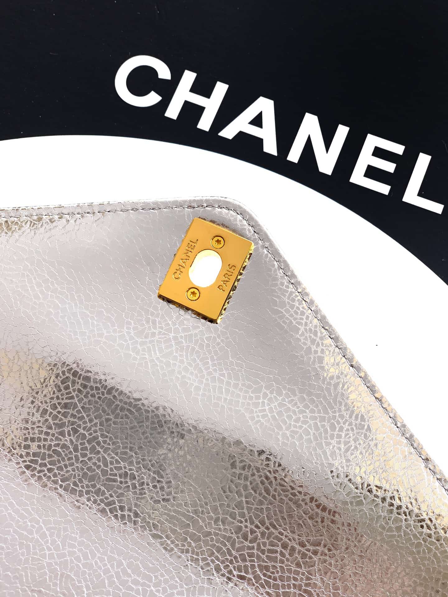 Chanel Flap Bag with Top Handle Metallic Chevron Lambskin Leather Finish& Gold-Tone Metal Silver AS6044 A