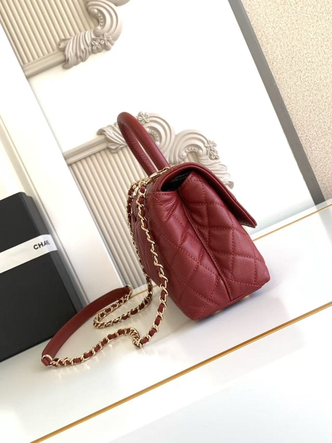 FLAP BAG WITH TOP HANDLE Grained Calfskin & Gold-Tone Metal A92990 Red Binding A