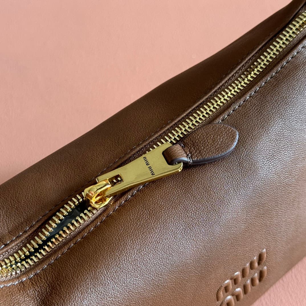 Miu Miu Nappa leather pouch 5NE841 Oak High