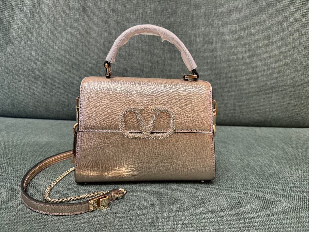 Valentino Garavani Vsling Mini Handbag In Grainy Calfskin With Jewel Logo High